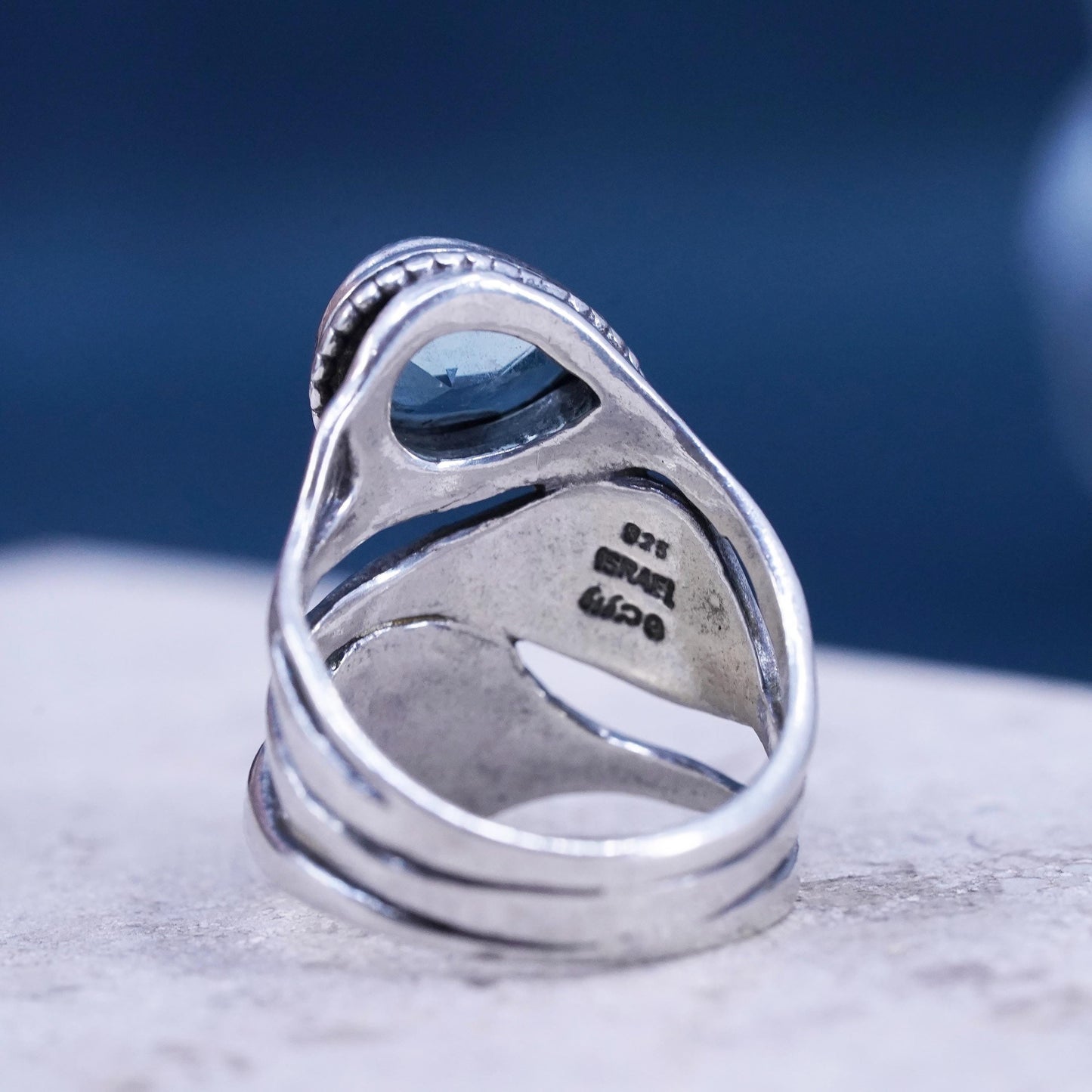 Size 8, vintage Israel Shablool Didae Sterling silver wavy ring with blue topaz