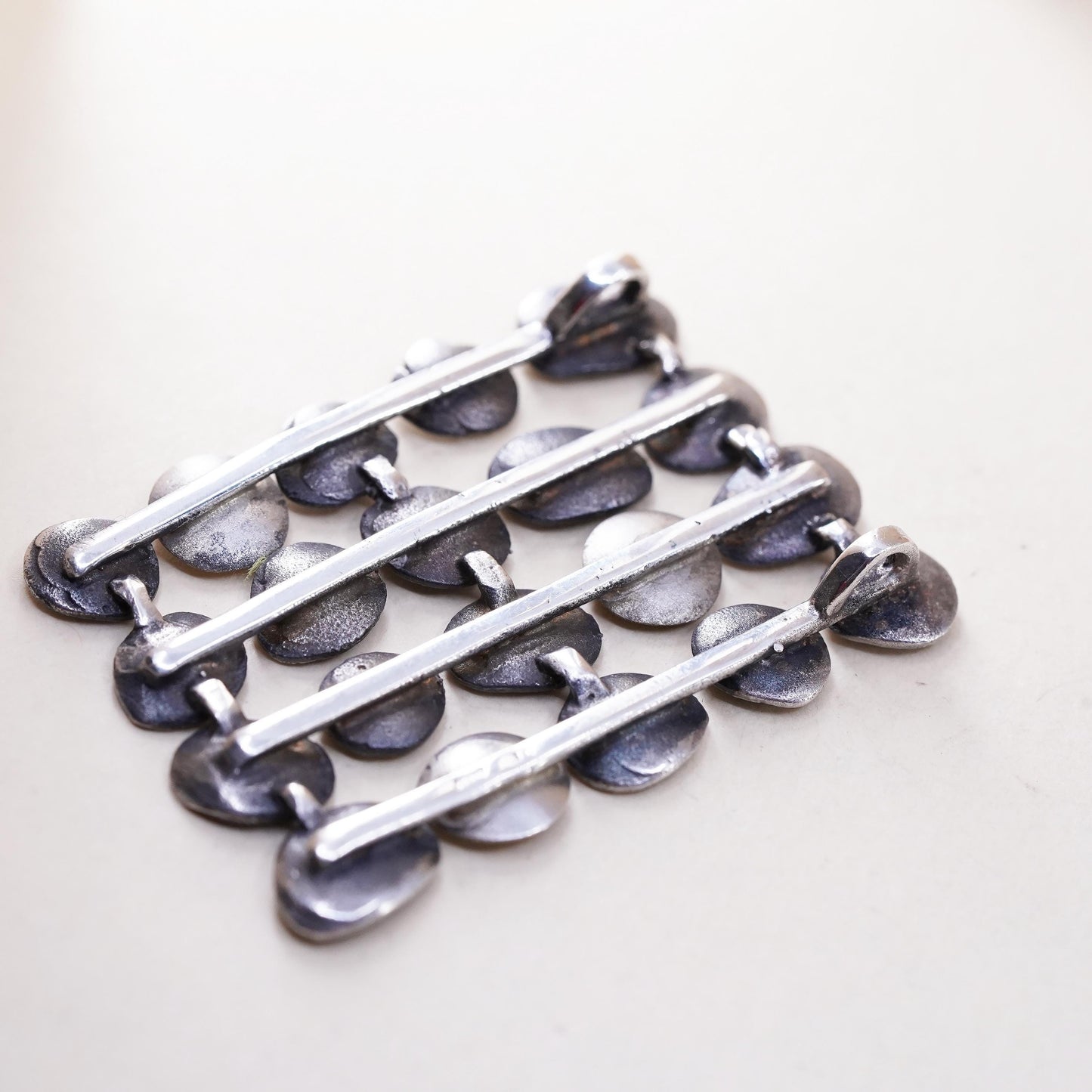 two tone sterling silver pendant, fine 925 pebble discs 14K yellow gold accent