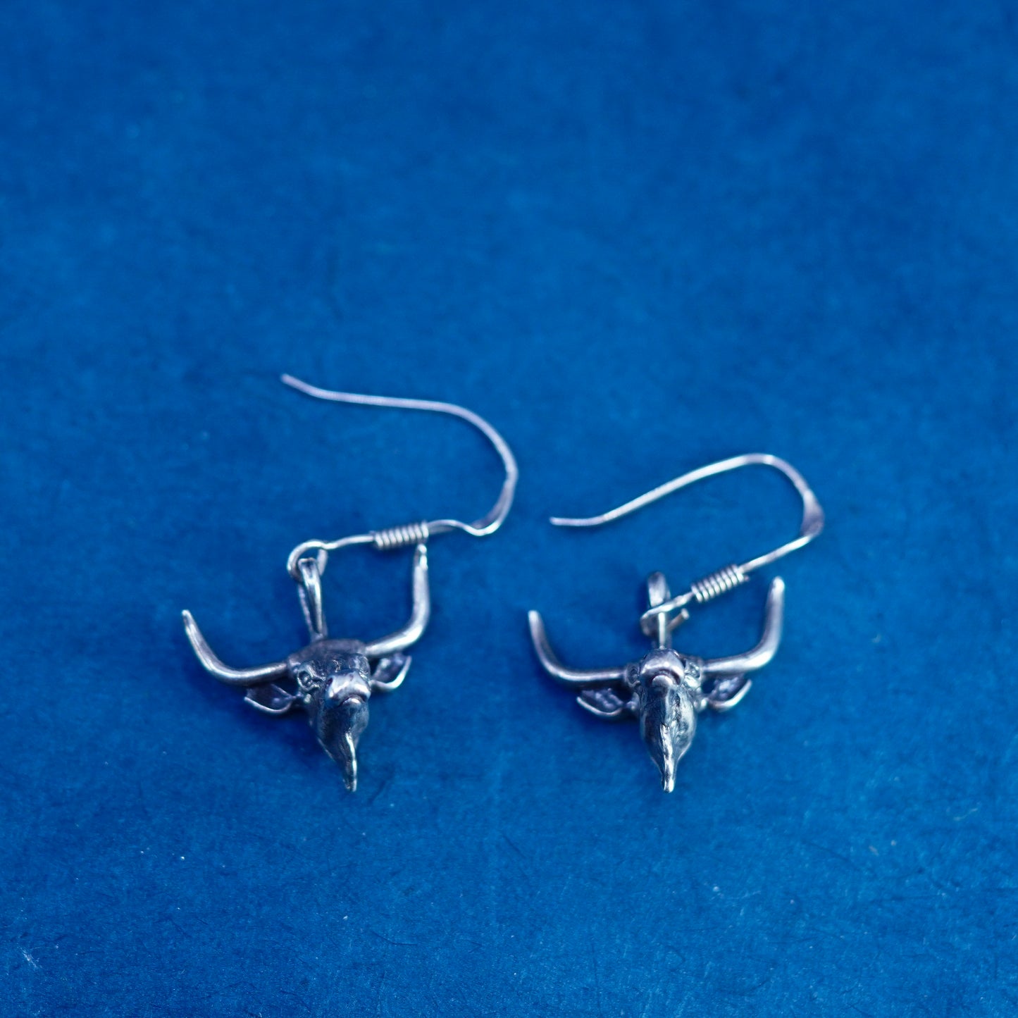 Vintage sterling silver handmade earrings with ox bull head