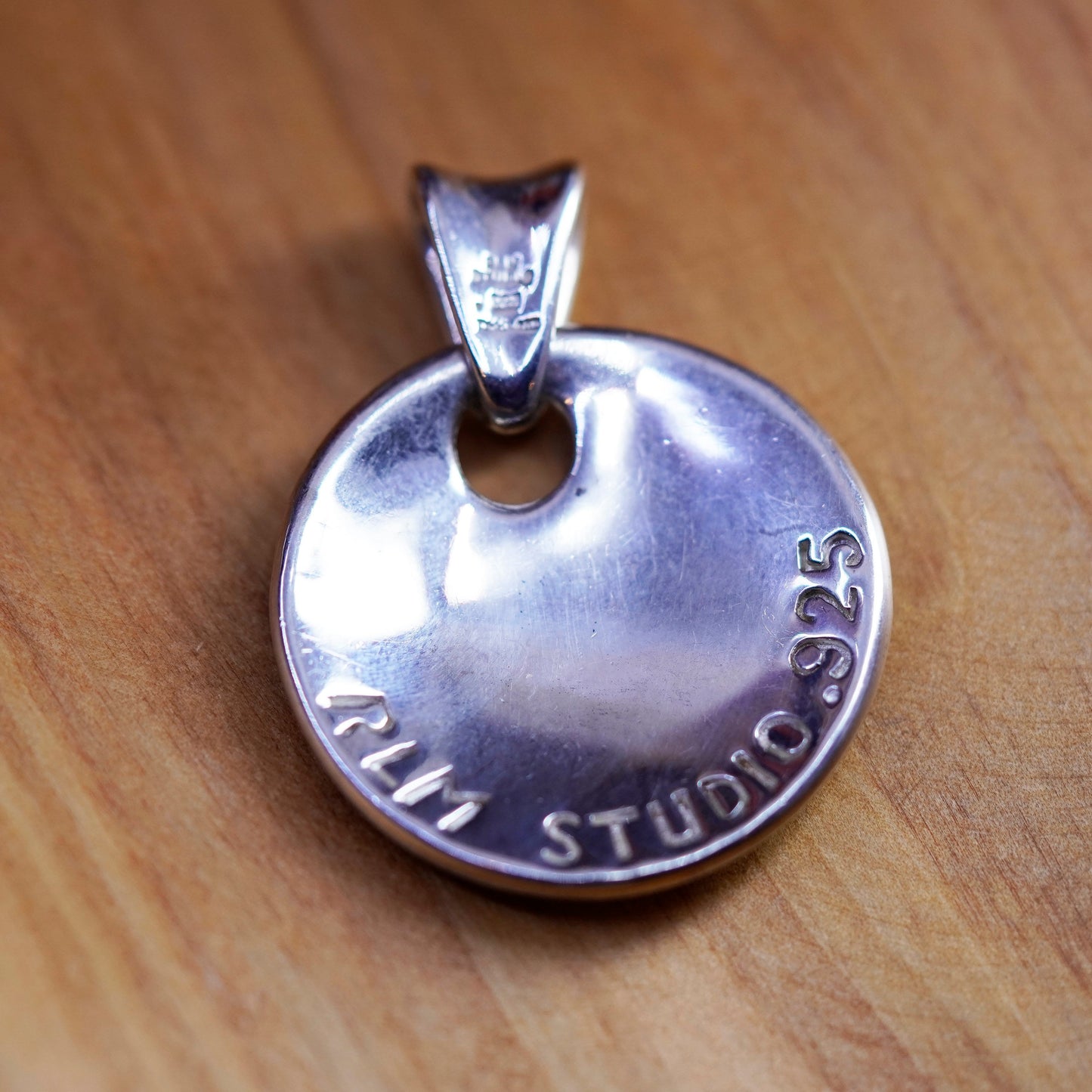 Vintage Robert Lee Morris Studio handmade pendant, 925 round disc “spirit”