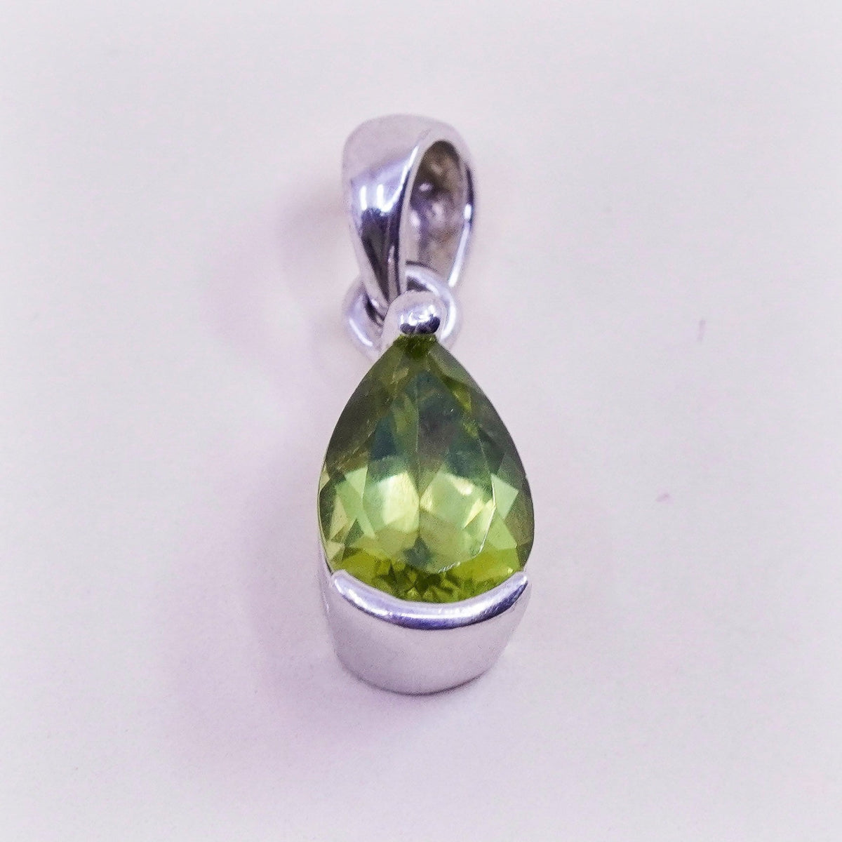 Vintage handmade Sterling 925 silver angel pendant with teardrop peridot