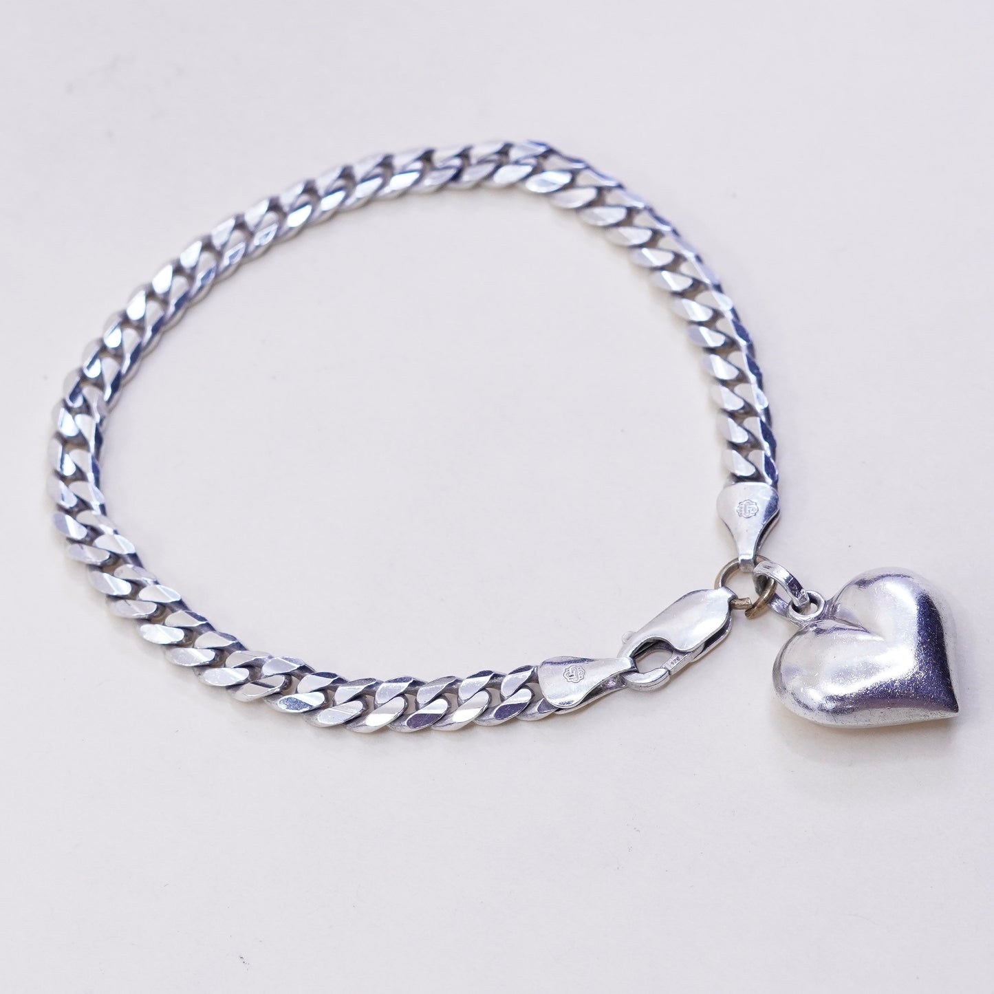 7.75”, sterling silver flatten curb bracelet, bold 925 chain with heart charm