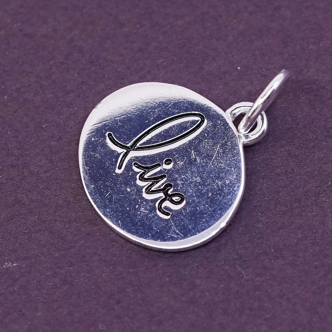 vtg Sterling silver handmade charm, 925 tag pendant embossed “live”