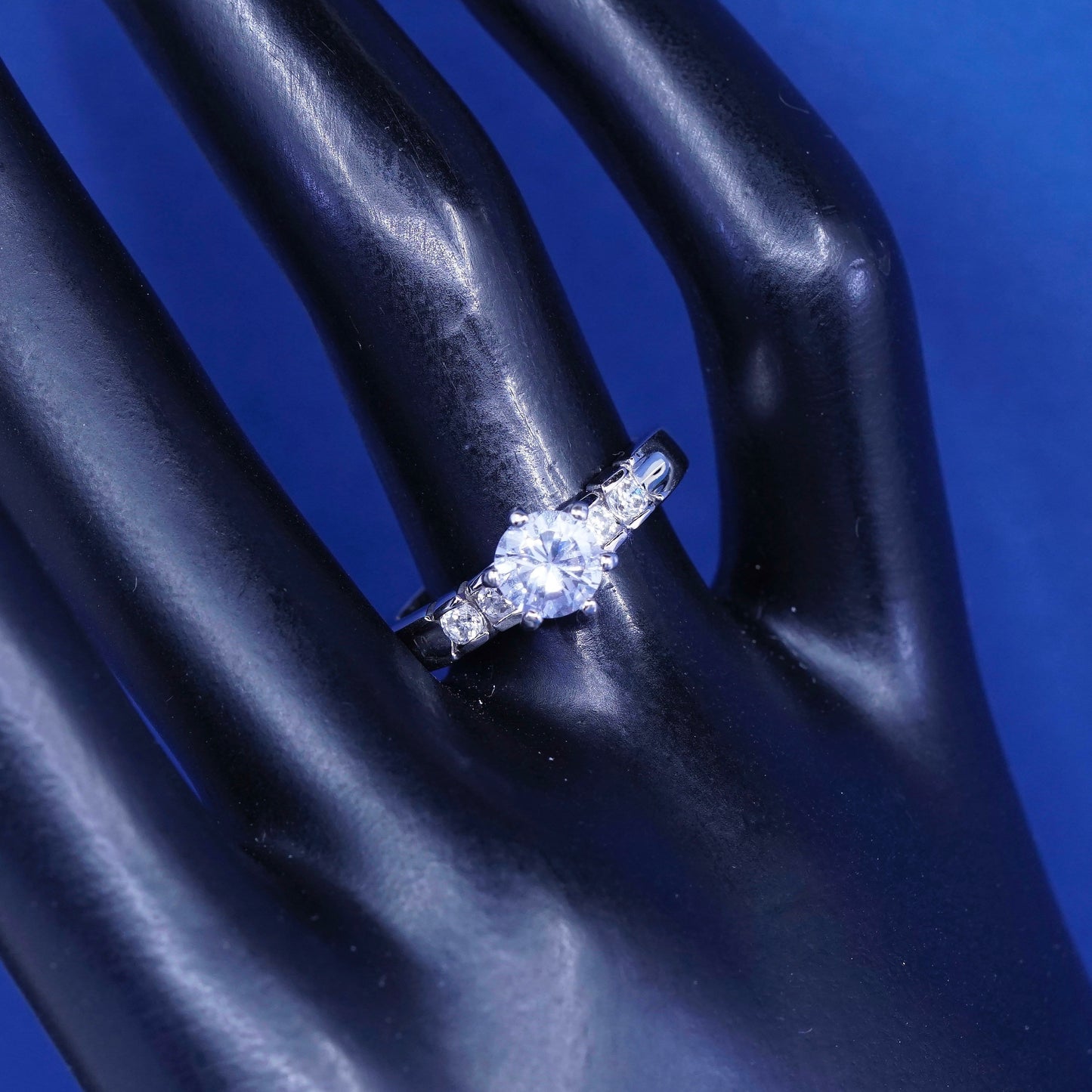 Size 7.25, vintage Sterling 925 silver engagement ring with clear cz stones