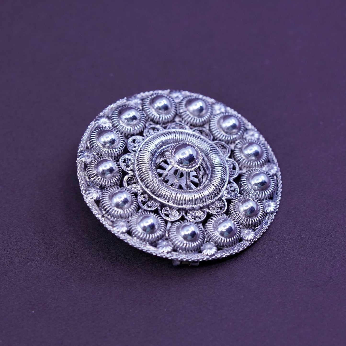Vintage handmade sterling silver round shaped filigree bead brooch