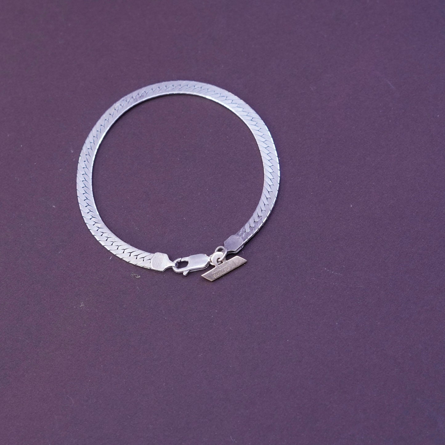 7”, Sterling silver herringbone bracelet, Italy 925 chain 10K gold Demco charm