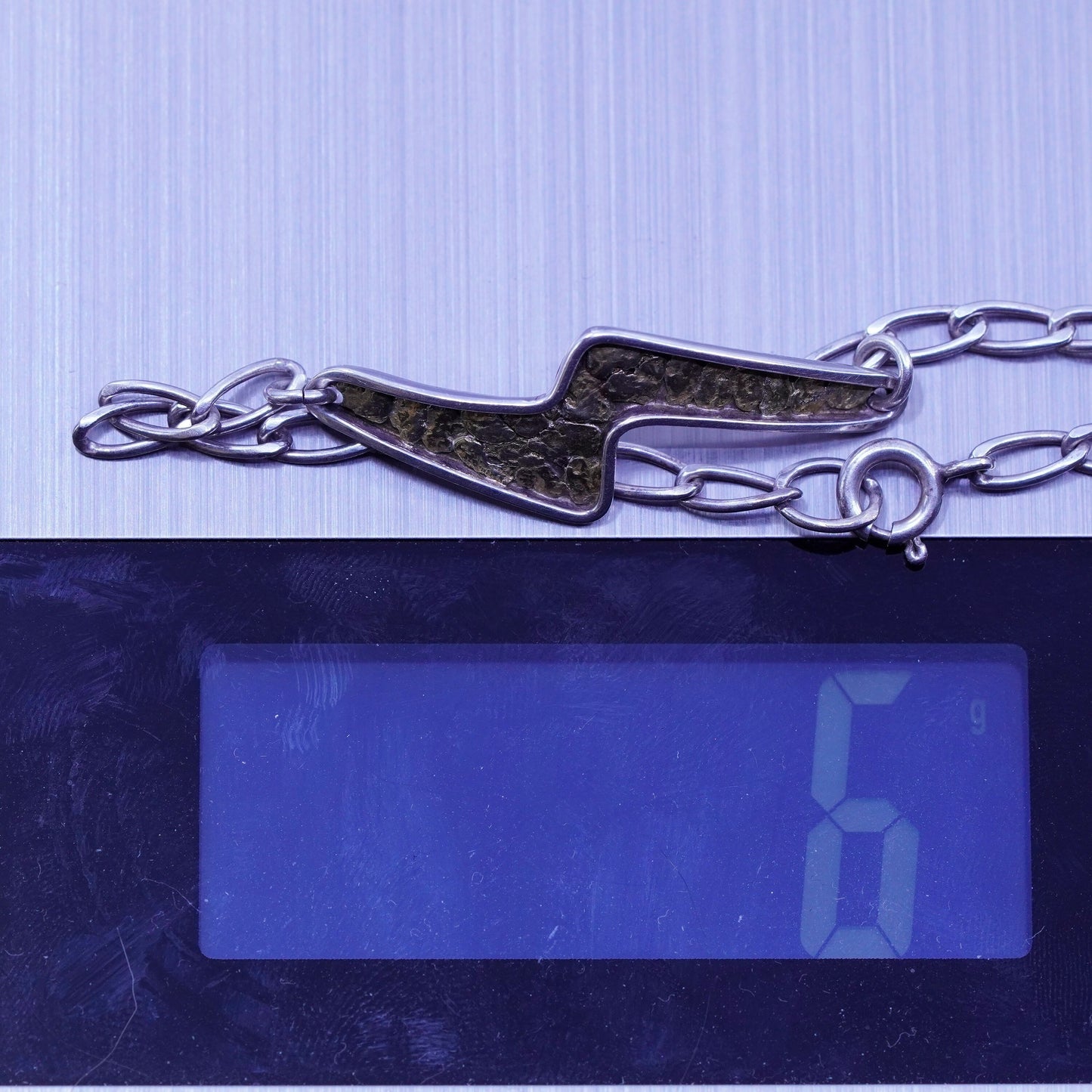 7.25”, Sterling 925 silver bracelet, oval chain with 14K gold lightening charm