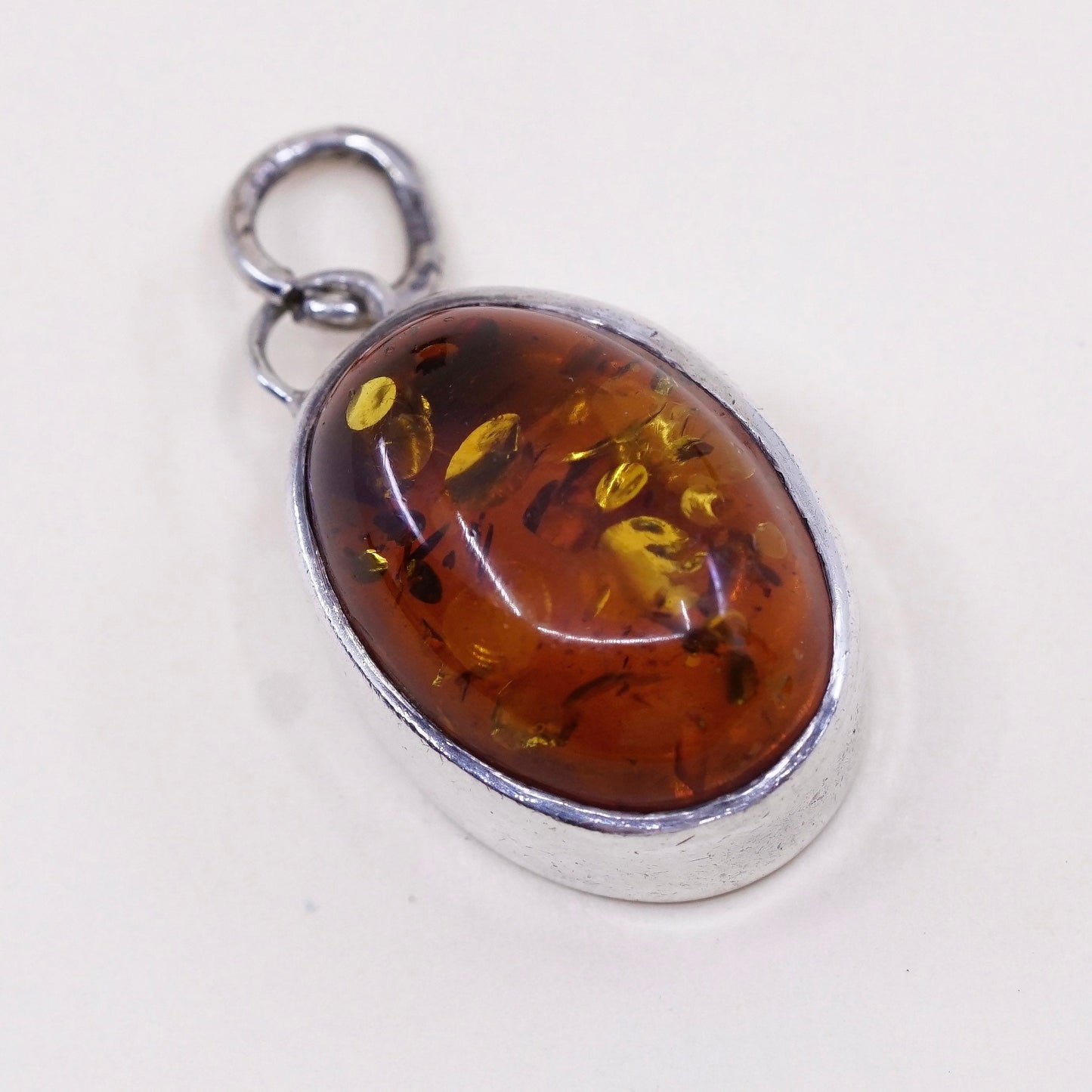 Vintage Lori Bonn sterling 925 silver handmade pendant with oval amber