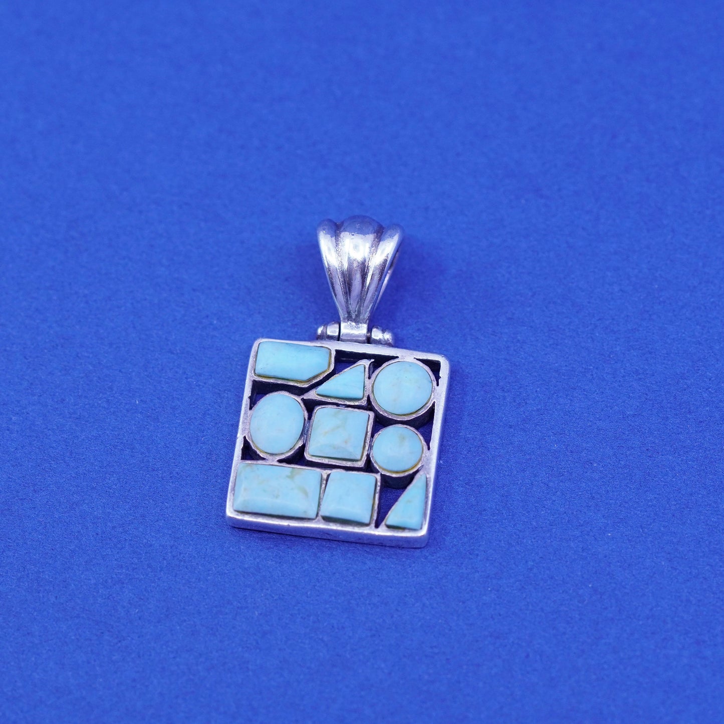 Vintage southwestern Sterling 925 silver handmade pendant with turquoise