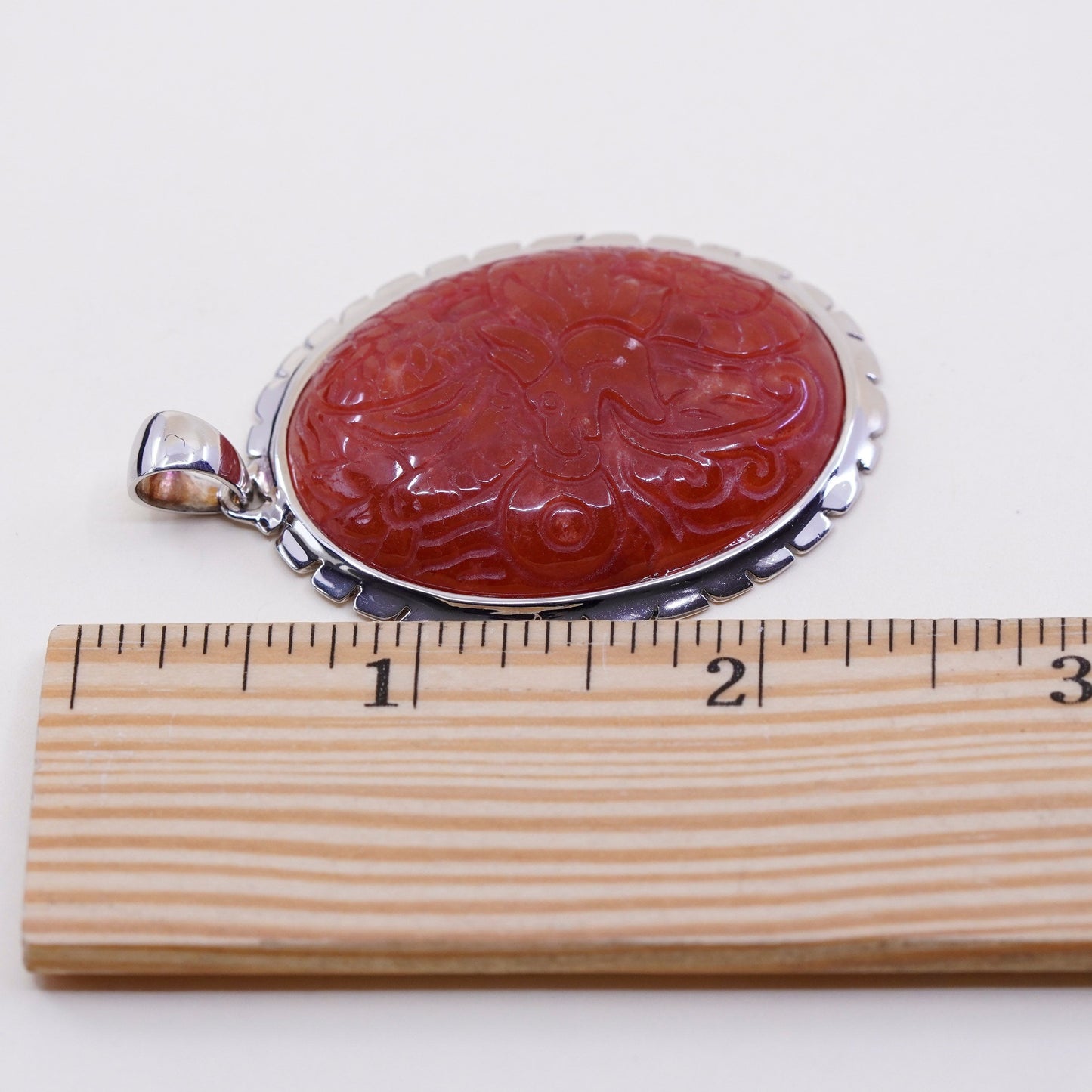 Vintage sterling 925 silver handmade pendant with carved carnelian