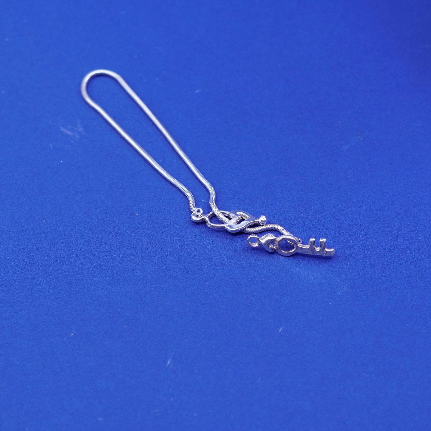 7.25”, 1.6mm, Sterling silver handmade bracelet, 925 snake chain w/ key N heart