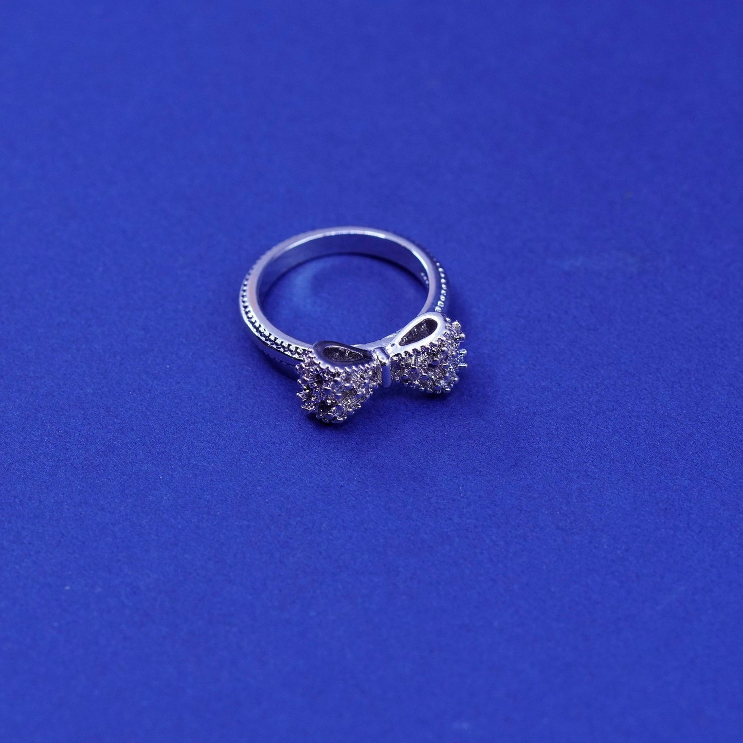 Size 4.5, vintage Sterling silver handmade ring, 925 bow tie ribbon ring w/ cz