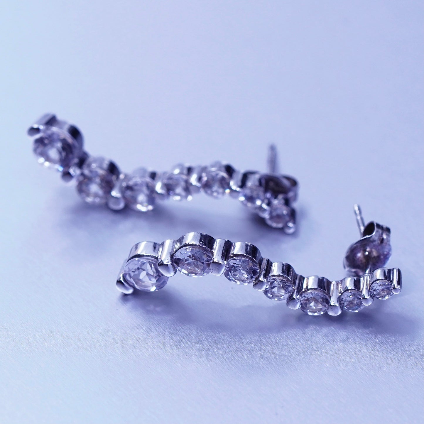 Vintage Sterling 925 silver earrings, wavy studs with Cz inlay
