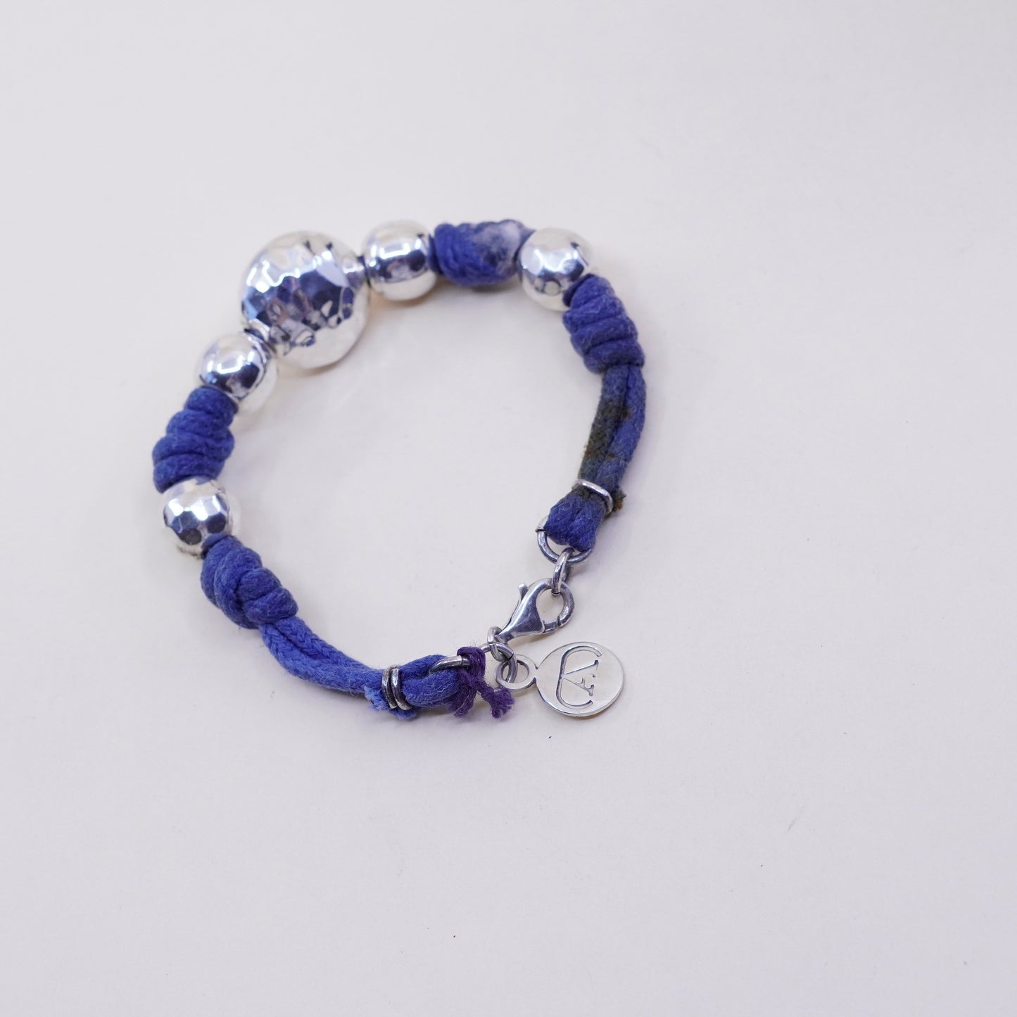 5.75”, vtg Sterling 925 silver bracelet, with linen thread and hammered beads