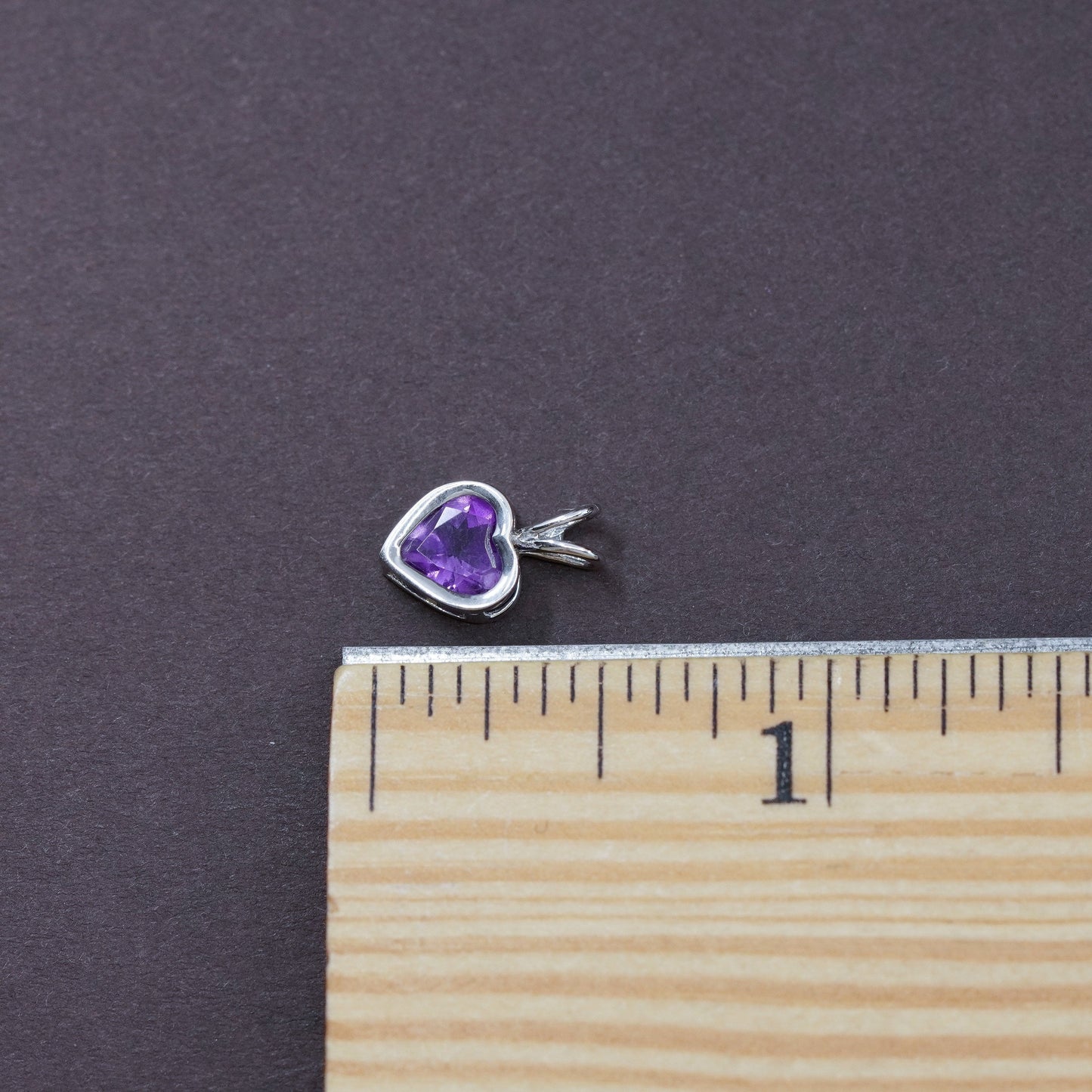 0.6g, Carla 14K white gold heart pendant with amethyst, stamped Carla 14K