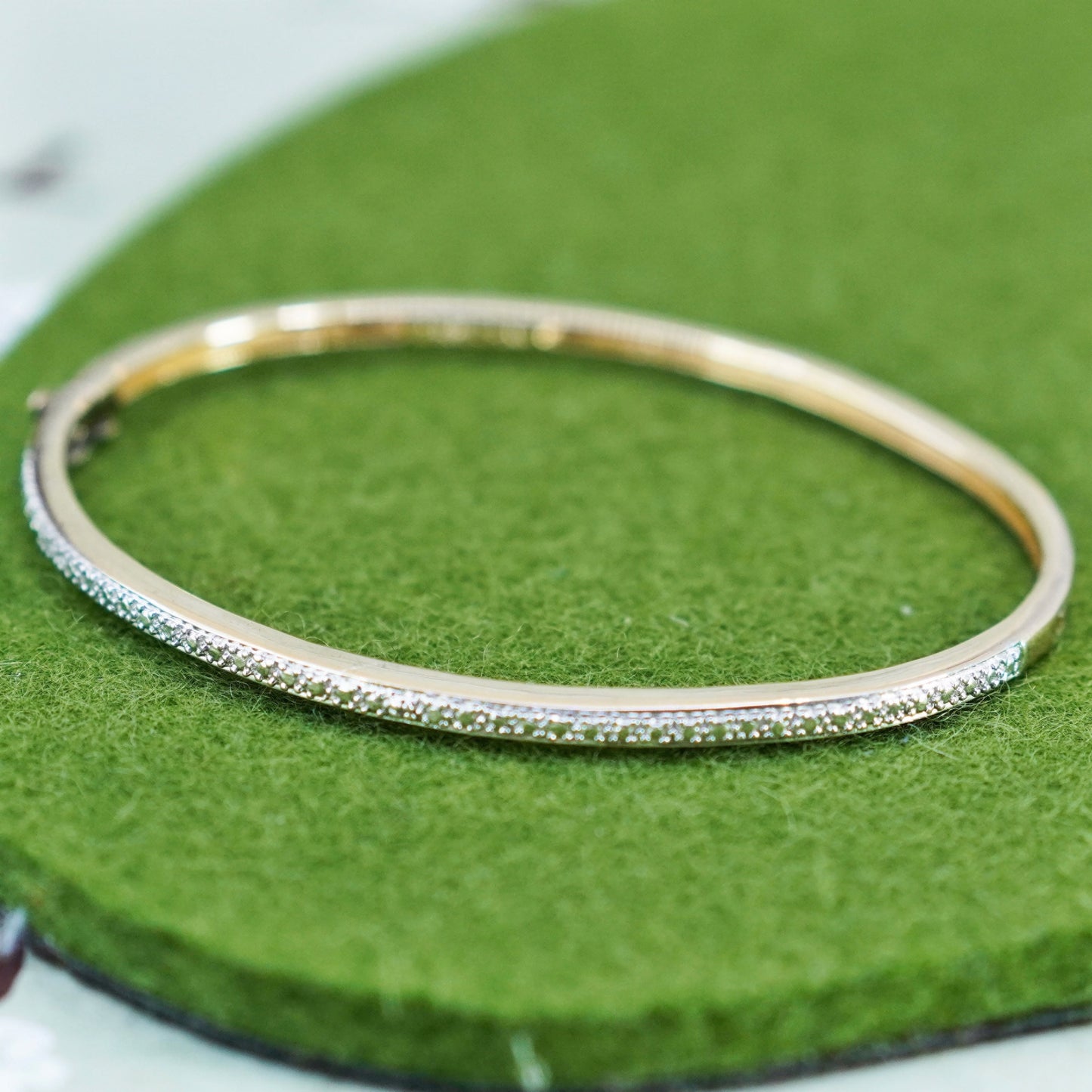 6.5”, vermeil gold over Sterling silver hinged bangle bracelet with diamond