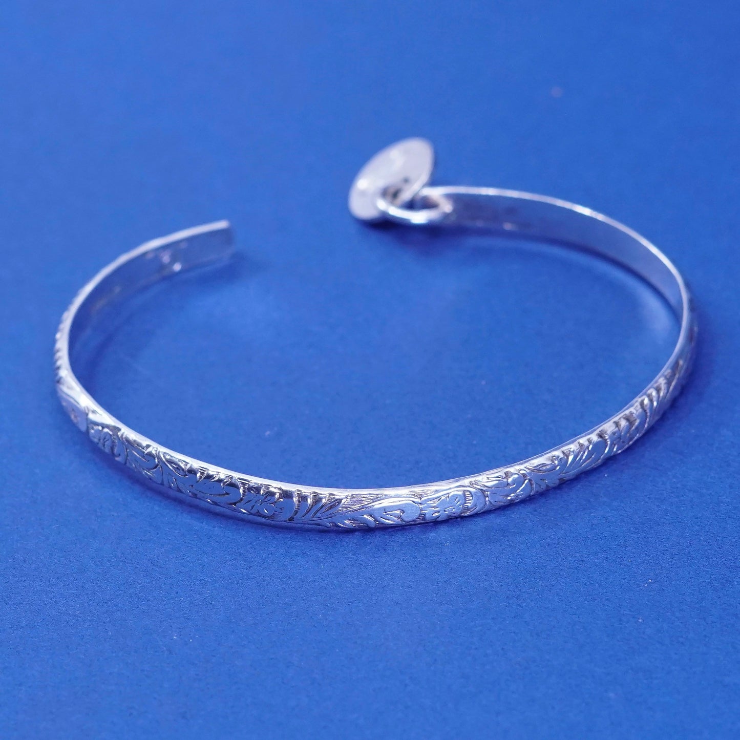 6.75”, sterling silver handmade bracelet, 925 textured cuff w/ “K” charm