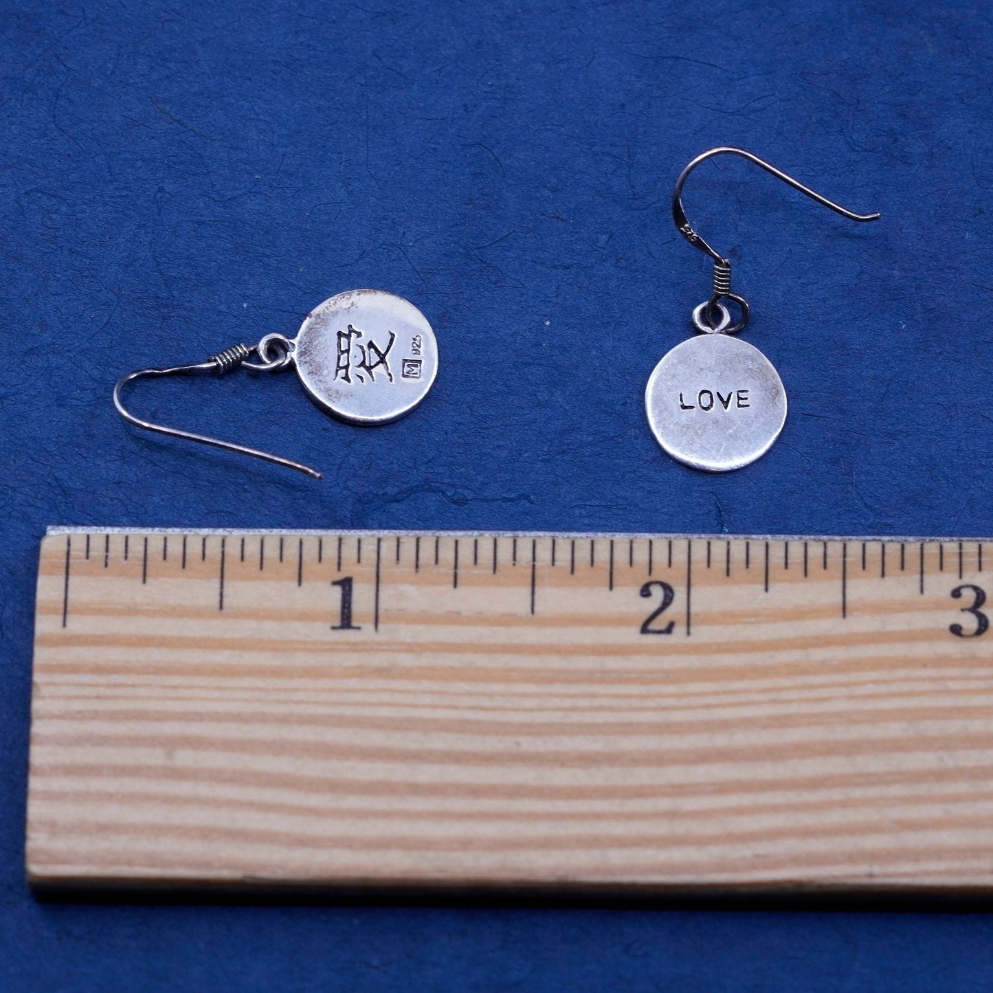 Sterling Silver handmade Earrings. 925 hammered circle disc embossed “love”