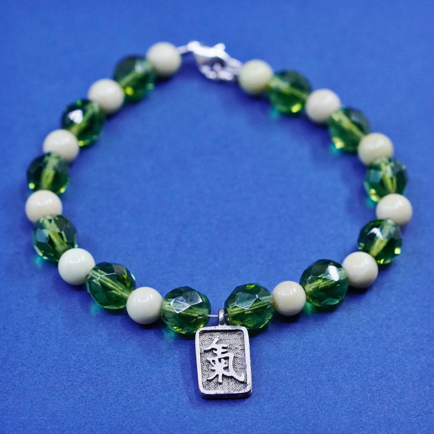 7”, sterling 925 silver handmade bracelet w/ green crystal beads energy charm