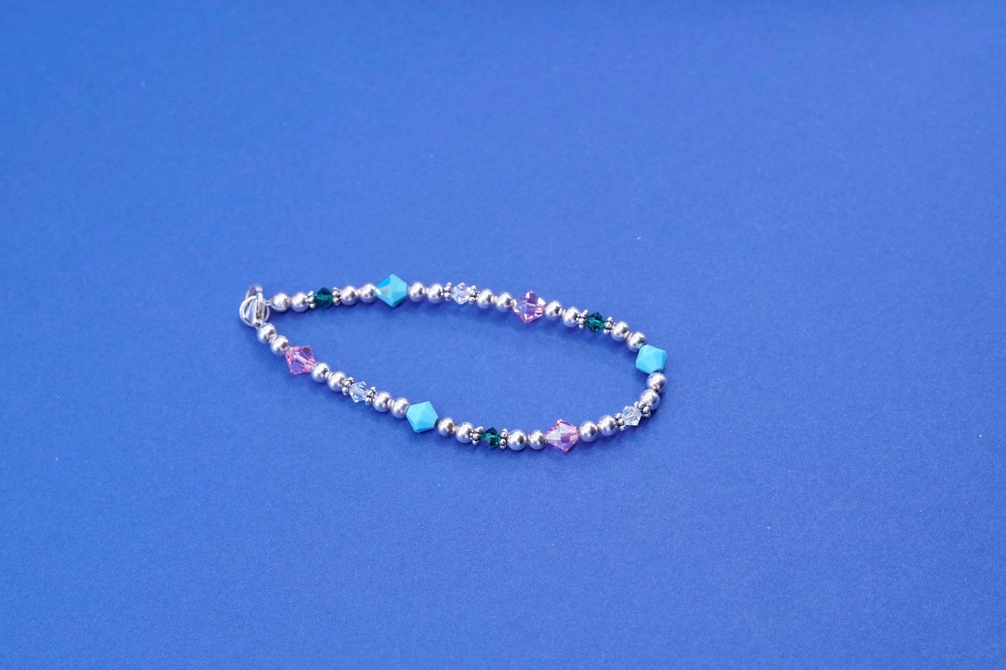 6.75”, sterling 925 silver handmade bracelet with turquoise pink crystal beads