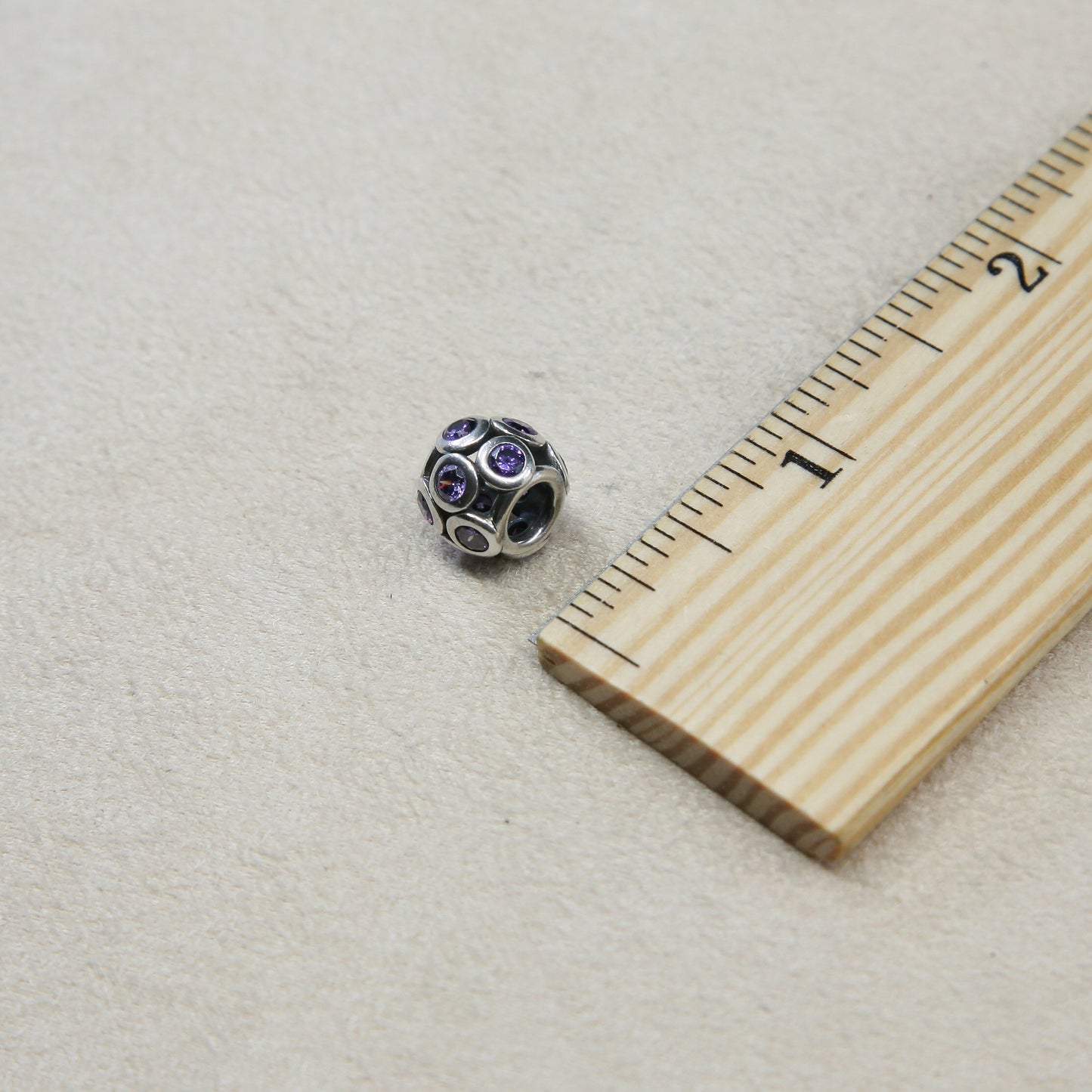 VTG Sterling silver handmade bead charm with amethyst around, silver tested