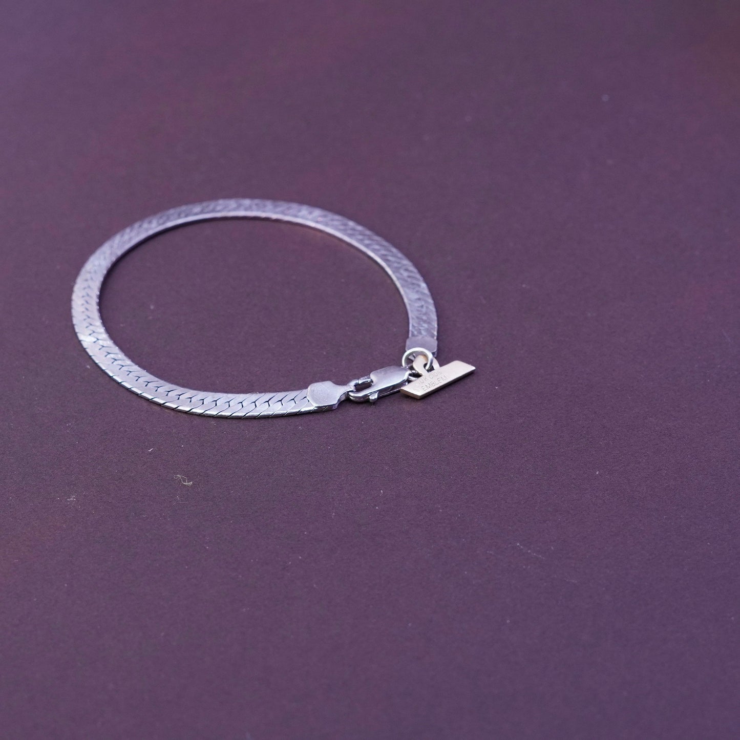 7”, Sterling silver herringbone bracelet, Italy 925 chain 10K gold Demco charm