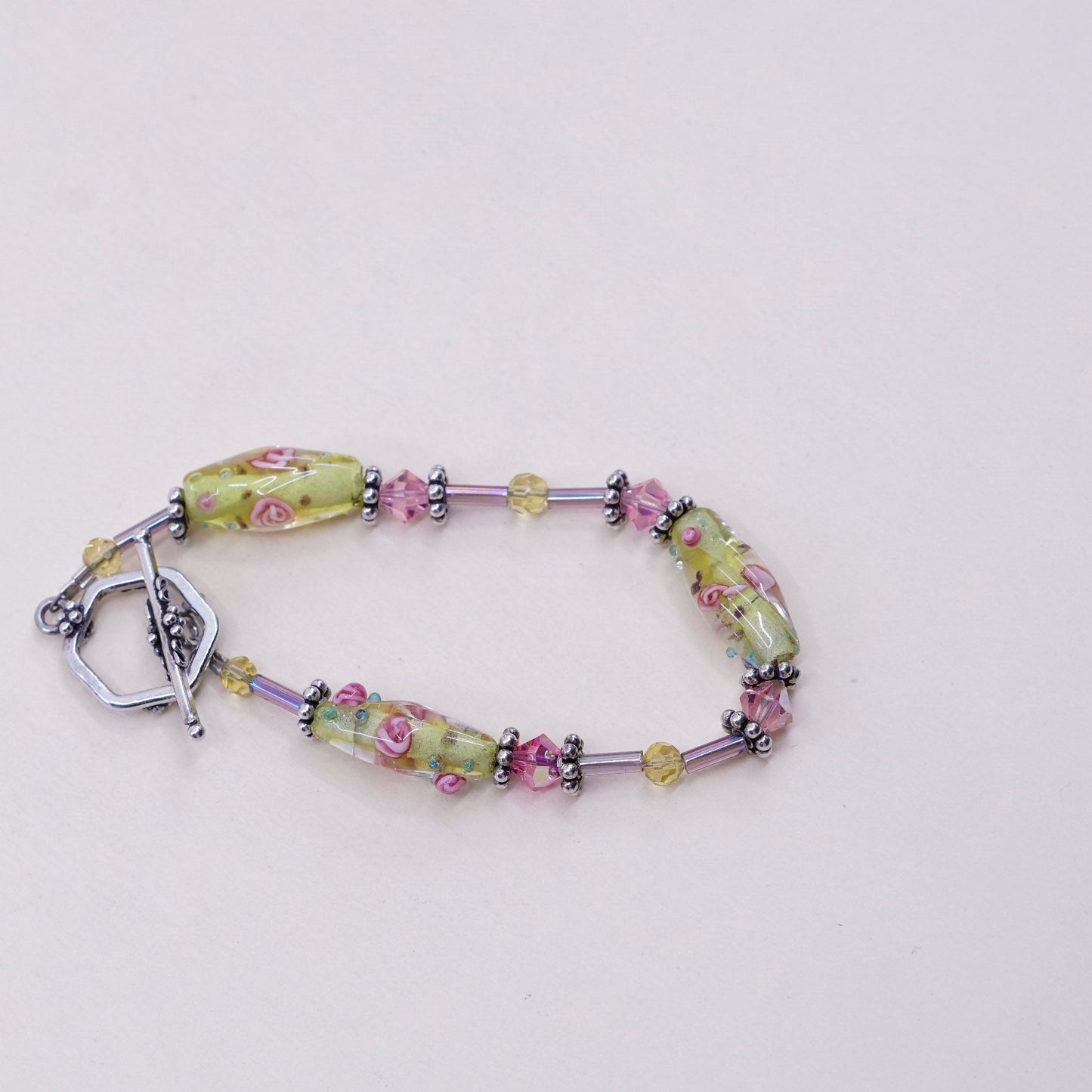 6.5”, vintage handmade bracelet with artisan glass and toggle closure