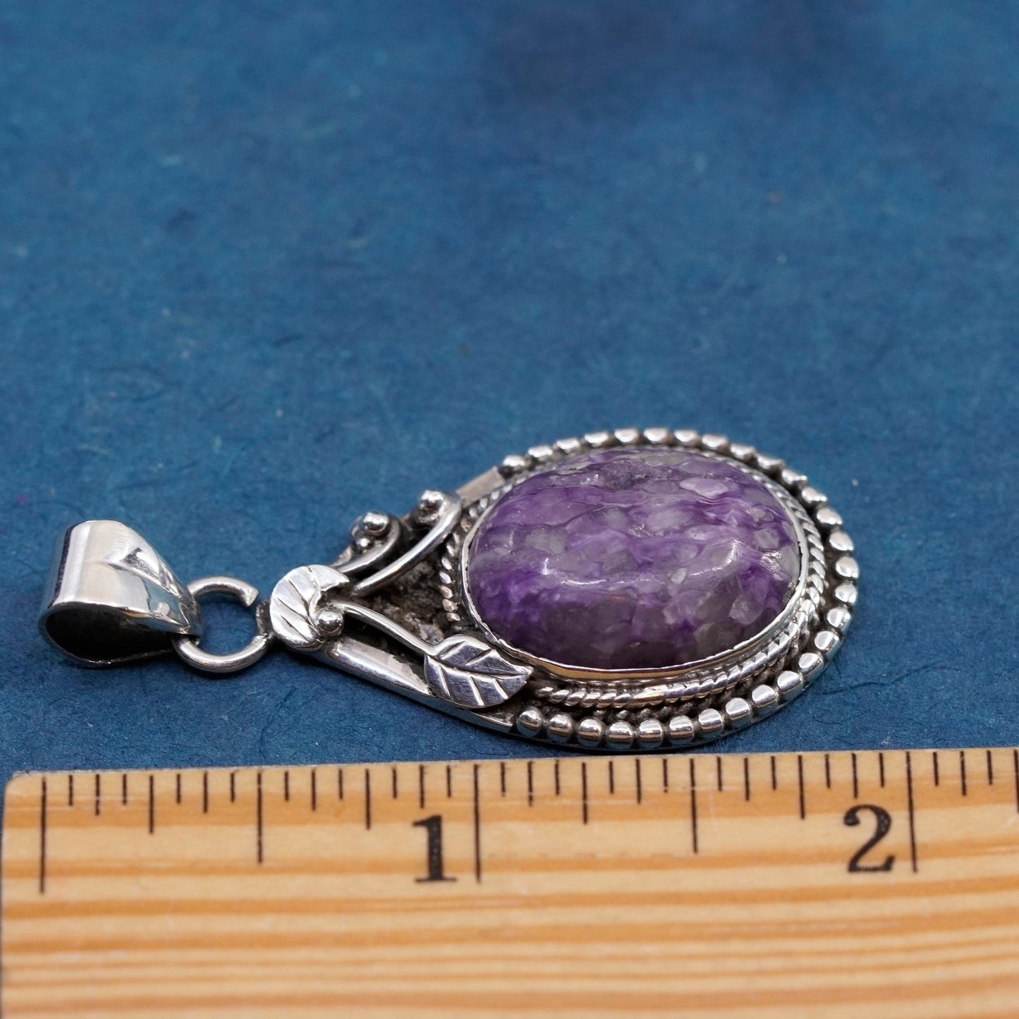 Vintage sterling 925 silver handmade pendant with oval amethyst and leaves