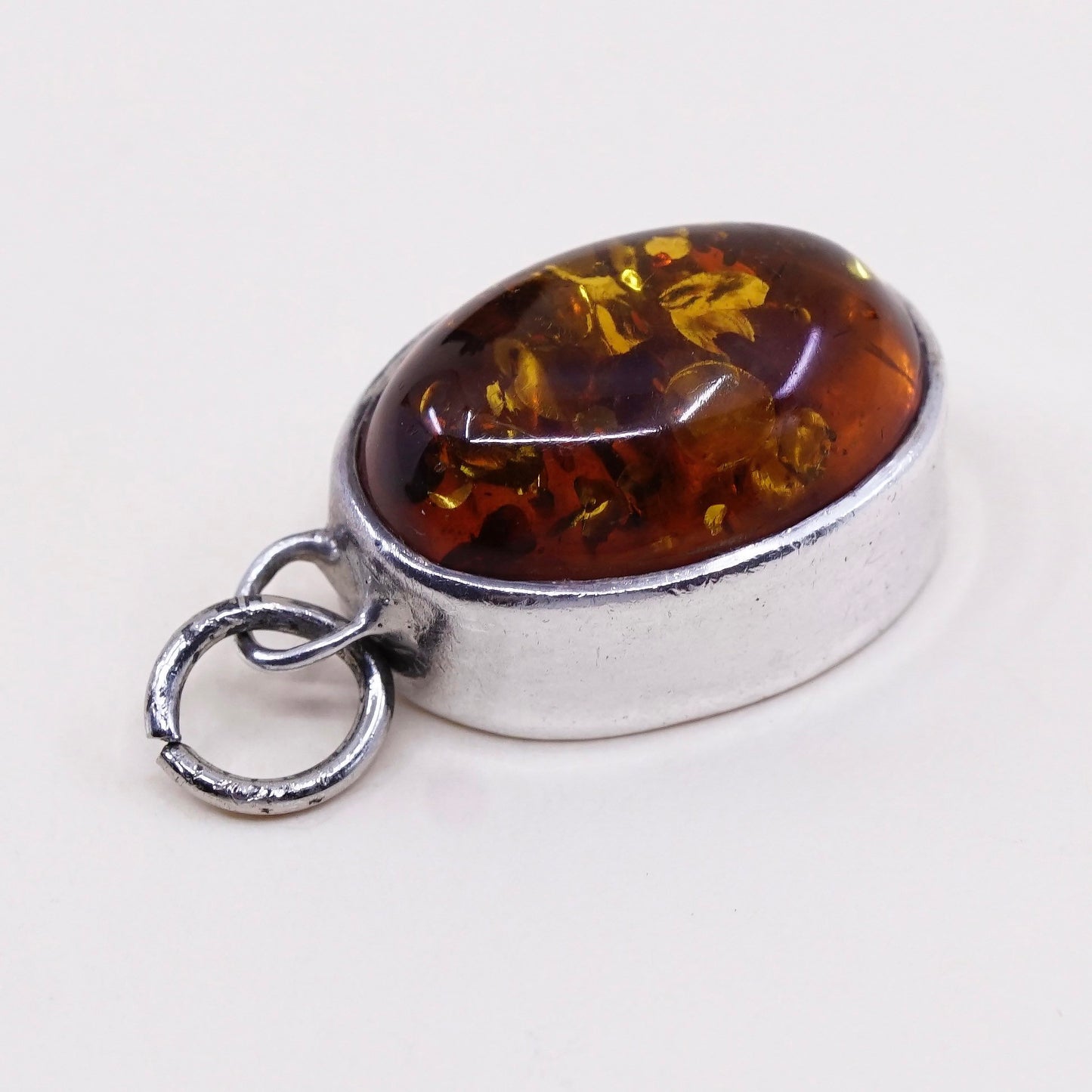 Vintage Lori Bonn sterling 925 silver handmade pendant with oval amber
