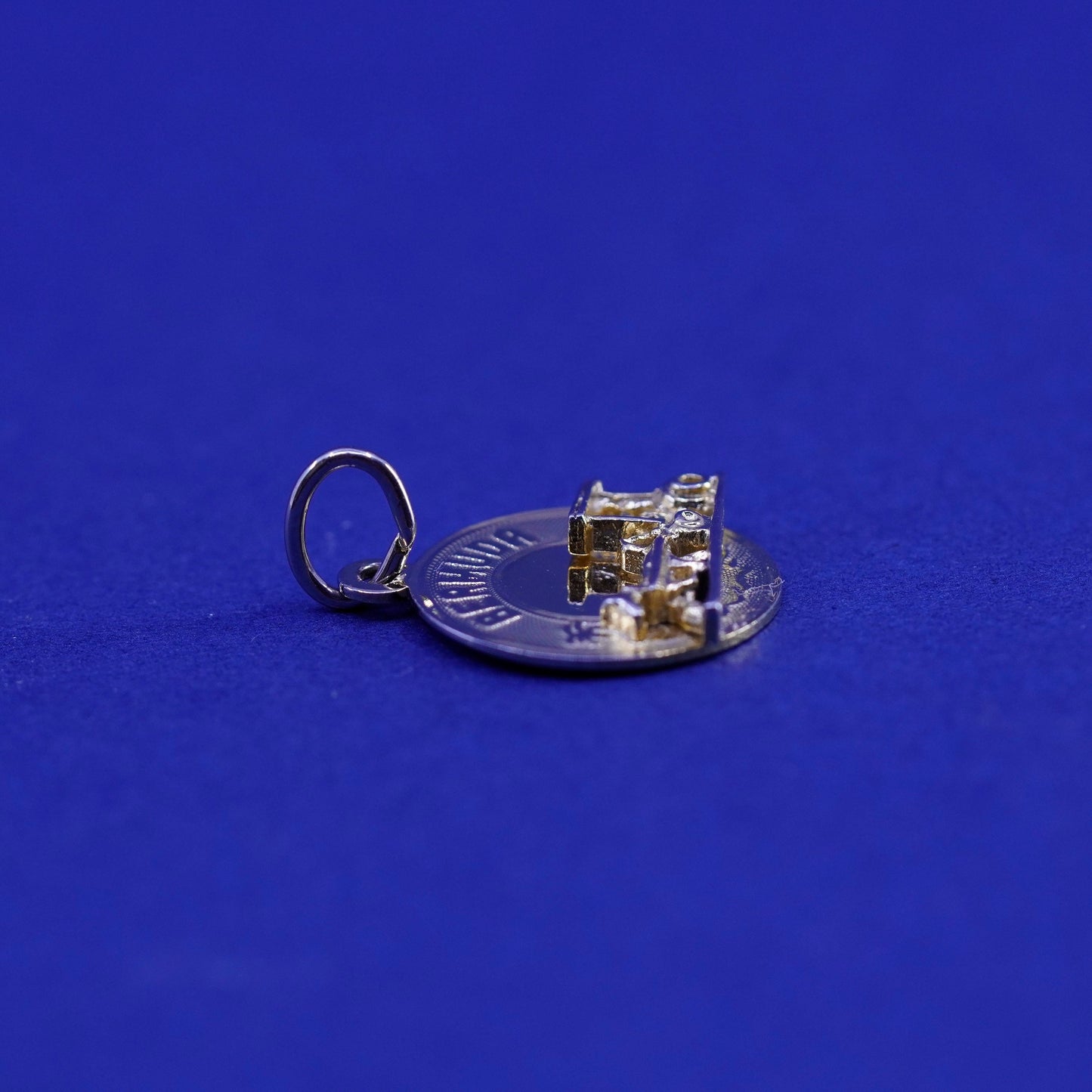Vintage 12K gold filled world traveler pendant. 925 bermuda charm horse wagon