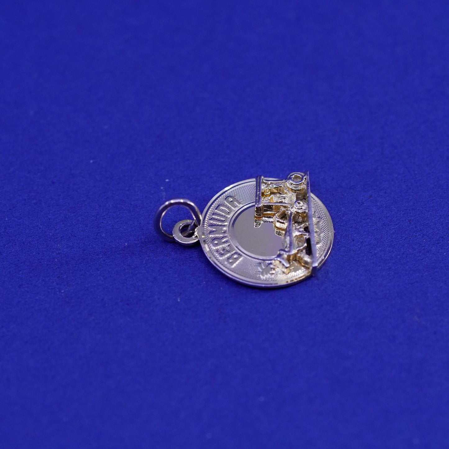 Vintage 12K gold filled world traveler pendant. 925 bermuda charm horse wagon