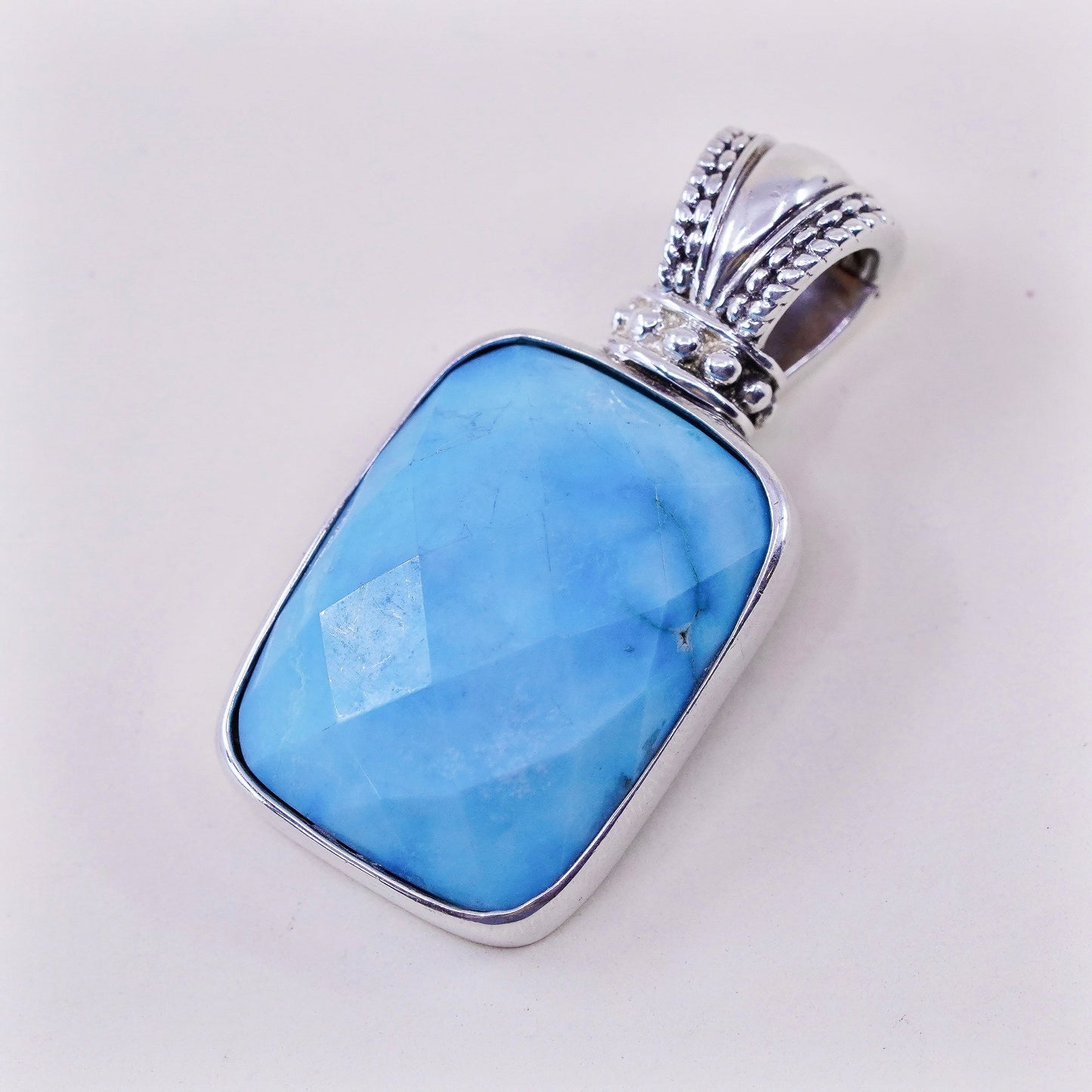 Vintage sterling silver handmade pendant, with checker cut Larimar