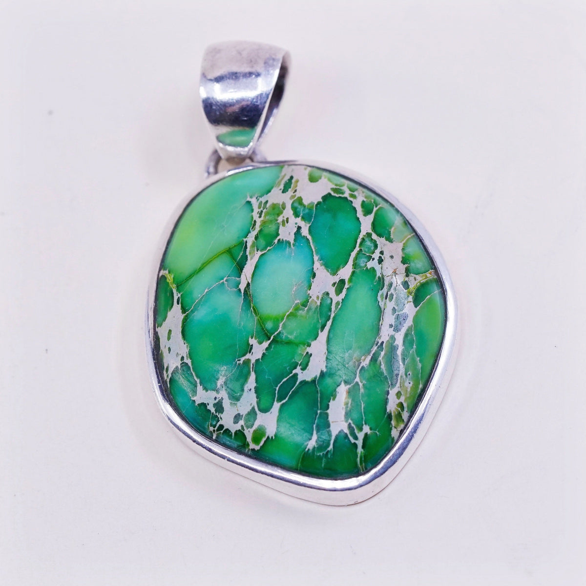 Sterling silver handmade pendant, Mexican 925 w/ Carioca lake turquoise