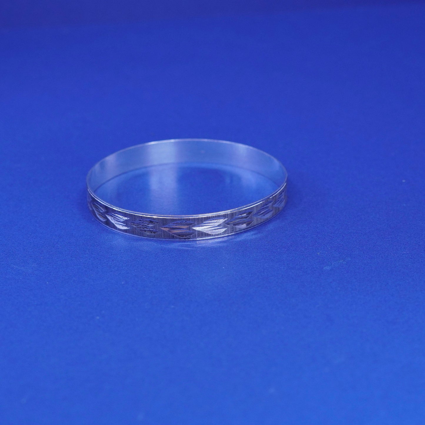 7.25”, vintage silver tone handmade bracelet, textured bangle