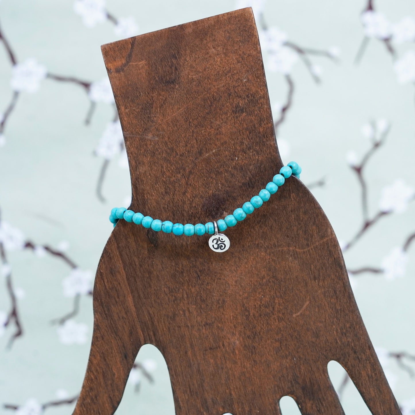6.75”, handmade bracelet turquoise beads elastic band sterling 925 silver charm