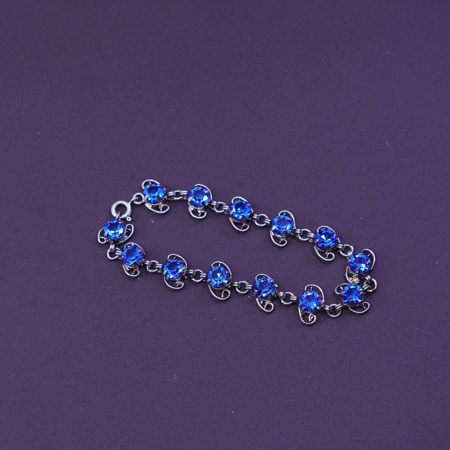 6.75”, vintage Sterling 925 silver handmade bracelet with blue topaz inlay