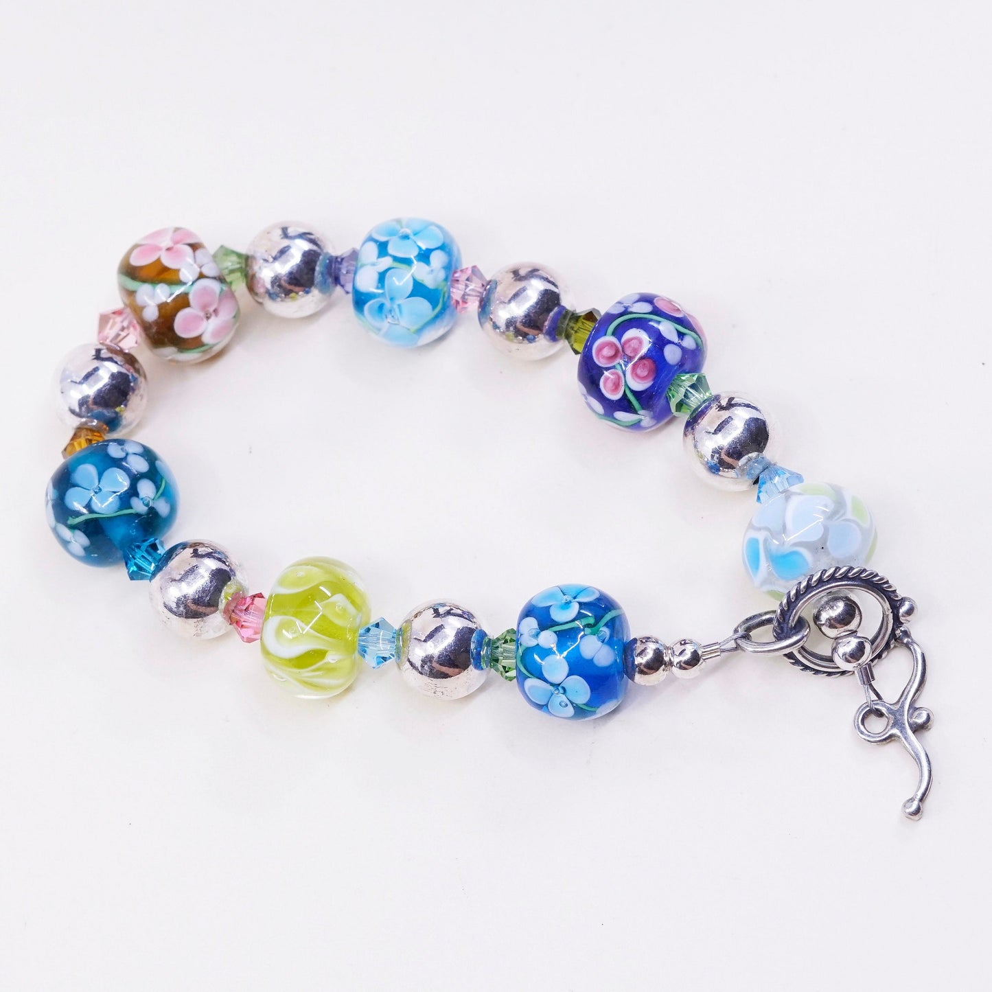 6.75”, vtg 925 Sterling silver bracelet w/ artisan floral glass beads N toggle