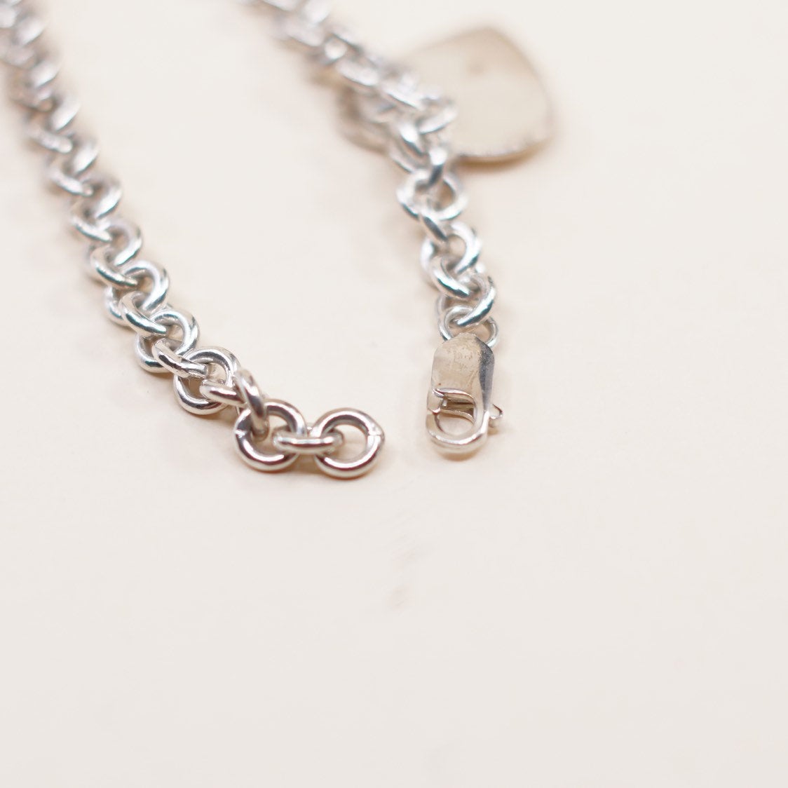 7.25”, VTG sterling silver circle link bracelet, circle chain w/ heart charm