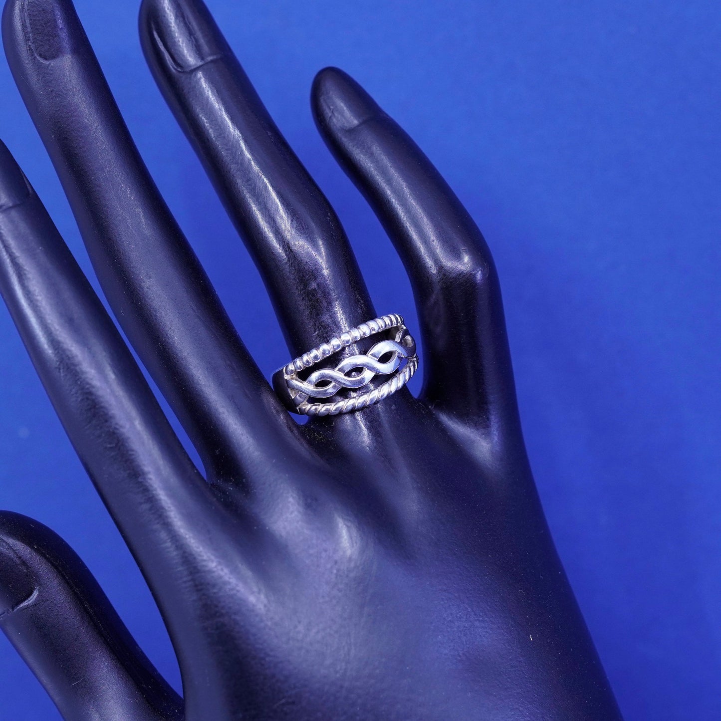 Size 8.25, Sterling silver ring, 925 cable band embossed “friends forever”