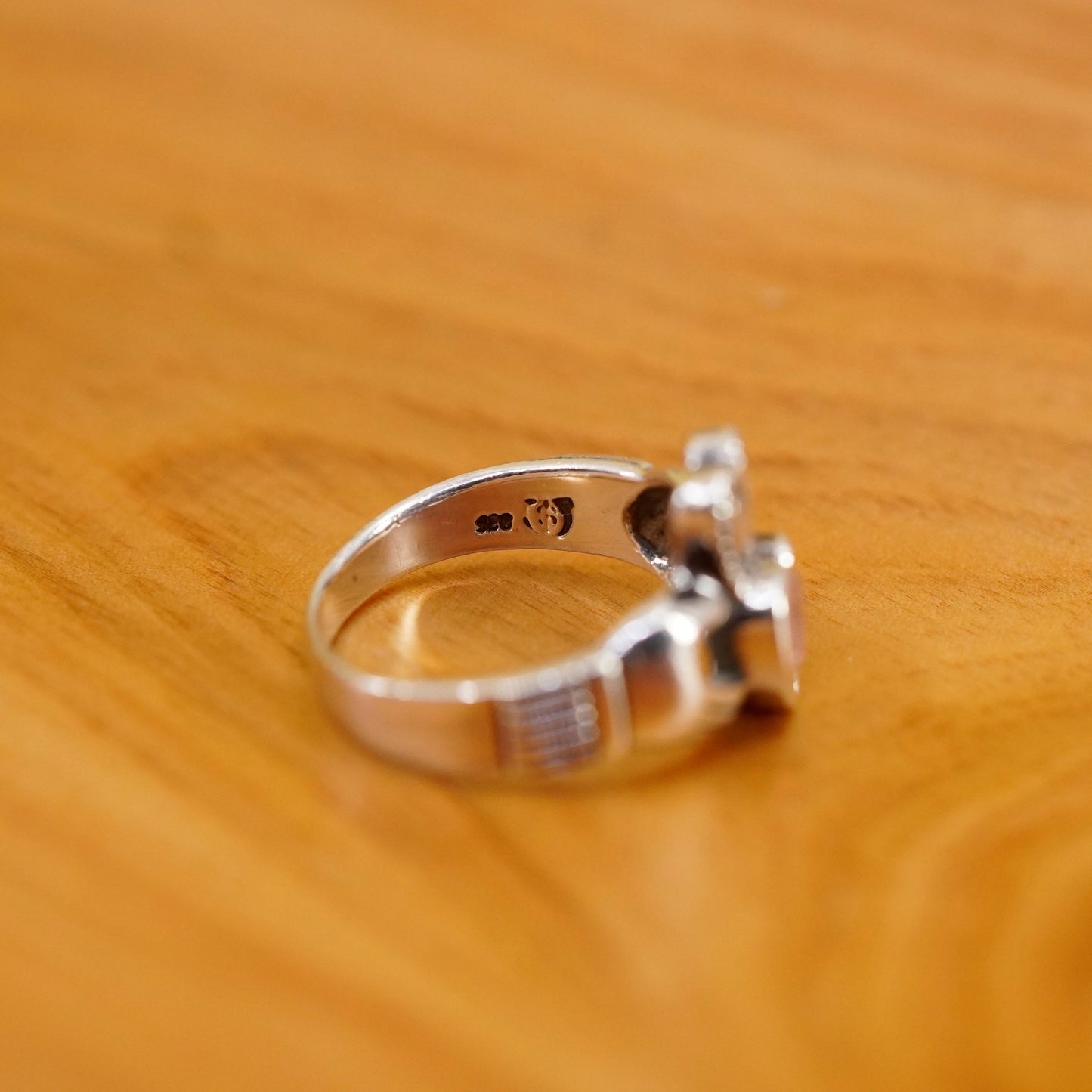 Size 7, Vintage sterling 925 silver claddagh ring, holding pink Cz heart band