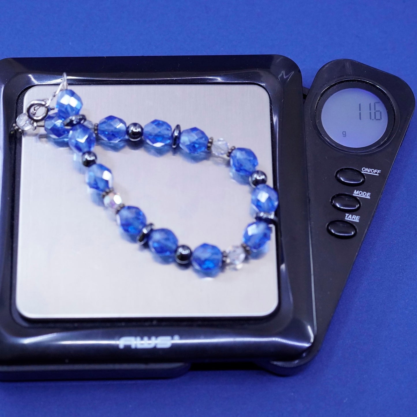 6.75”, sterling silver handmade bracelet, 925 clasp with blue crystal beads