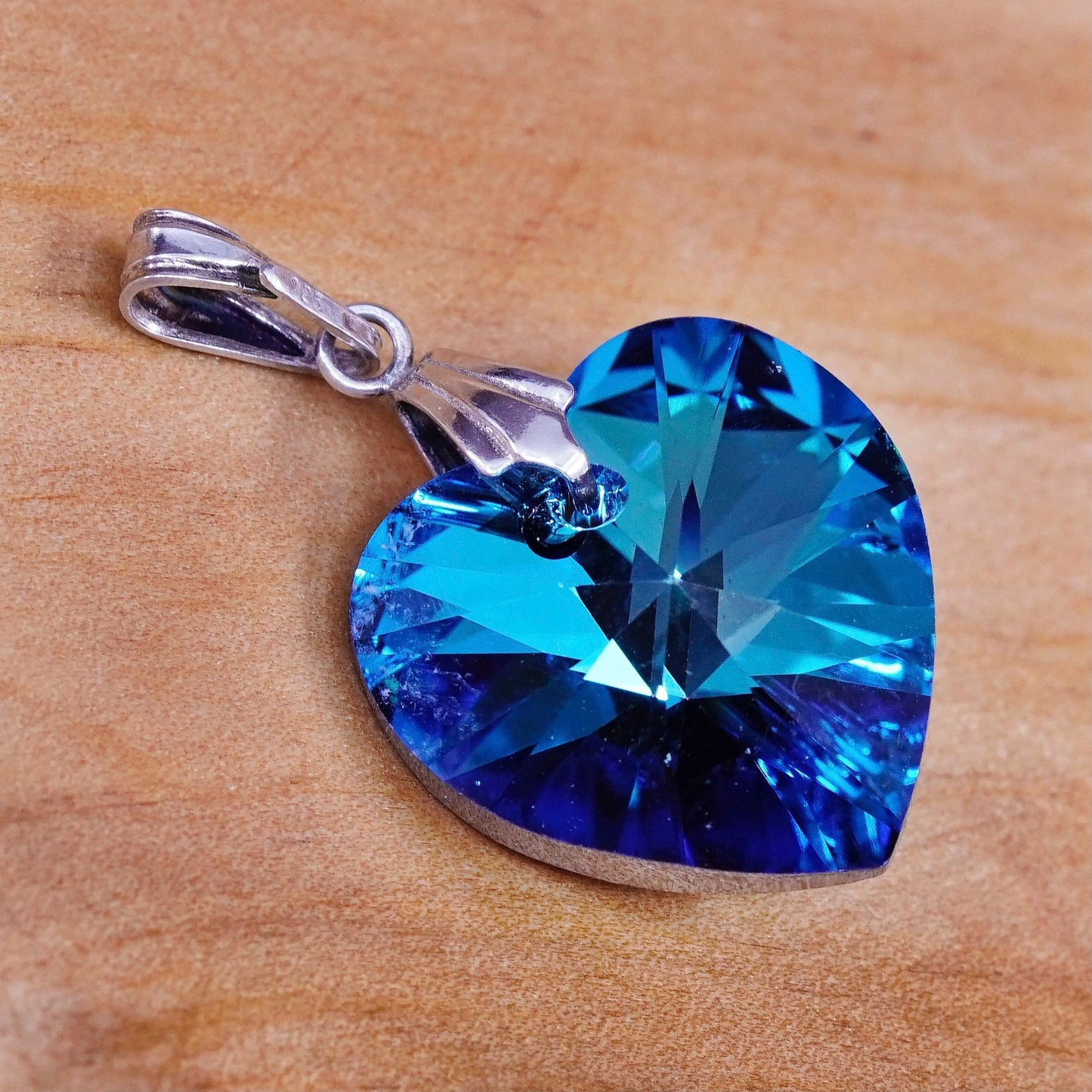 Vintage Sterling 925 silver heart shaped pendant with blue Swarovski crystal