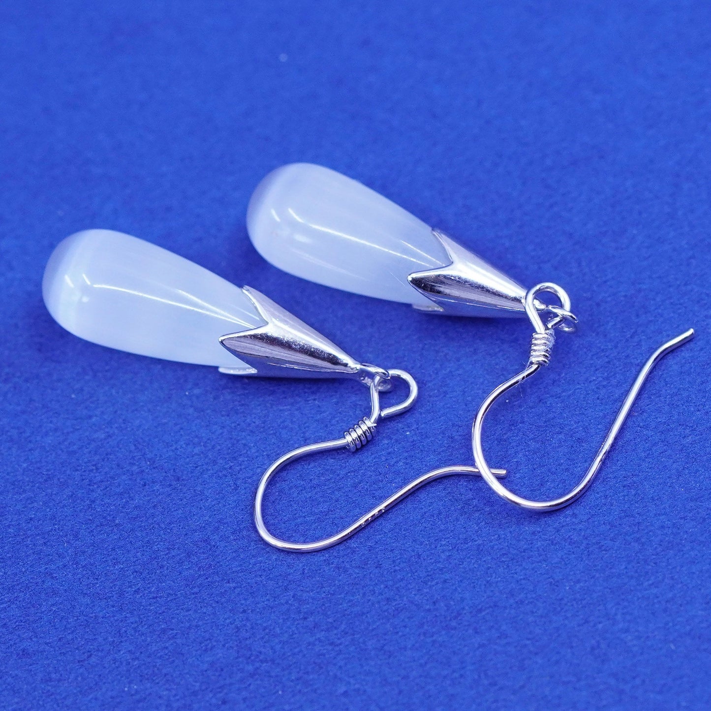 1.25”, Vintage sterling 925 silver handmade earrings w/ teardrop white cats eye