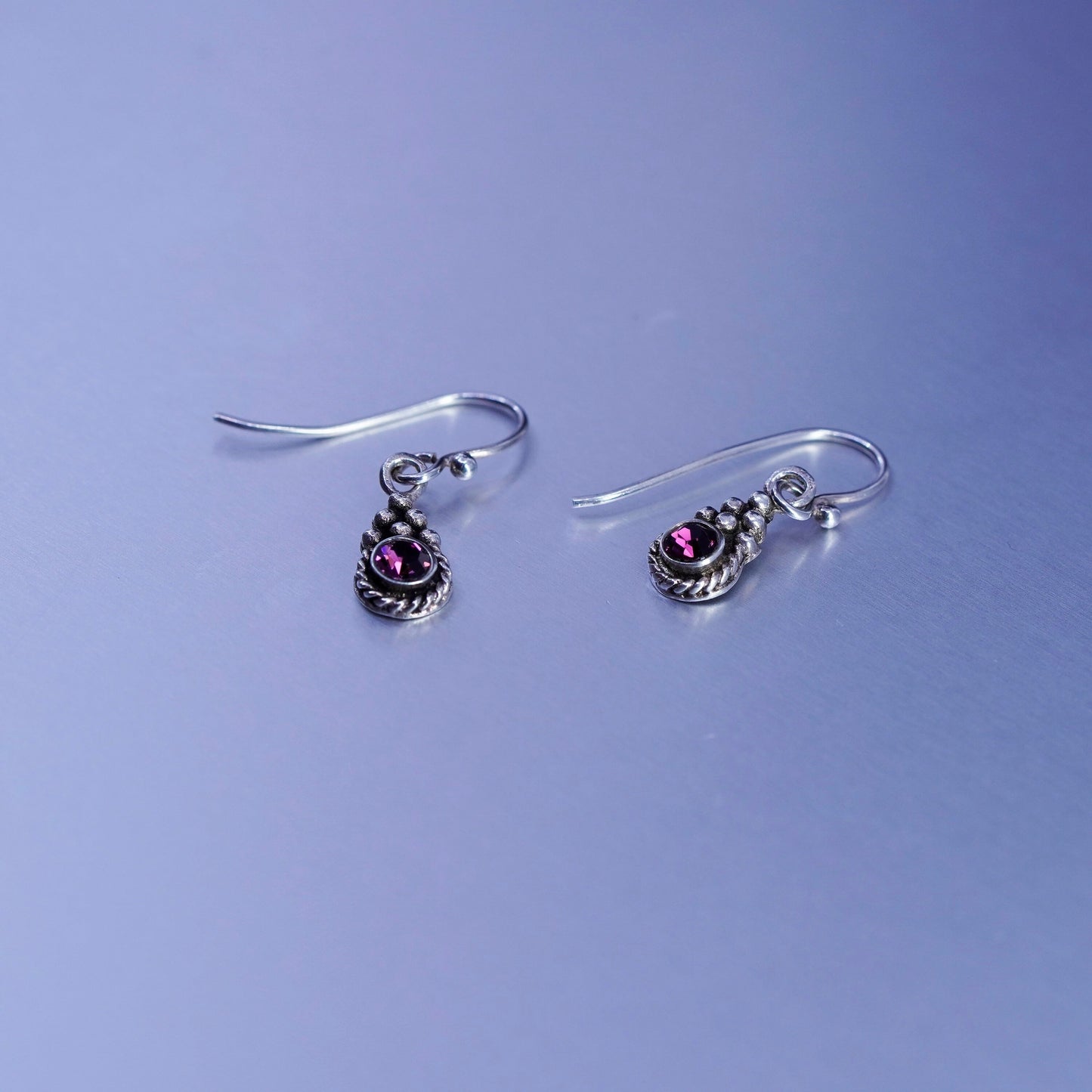 Vintage Sterling 925 silver earrings with purple crystal and cable around