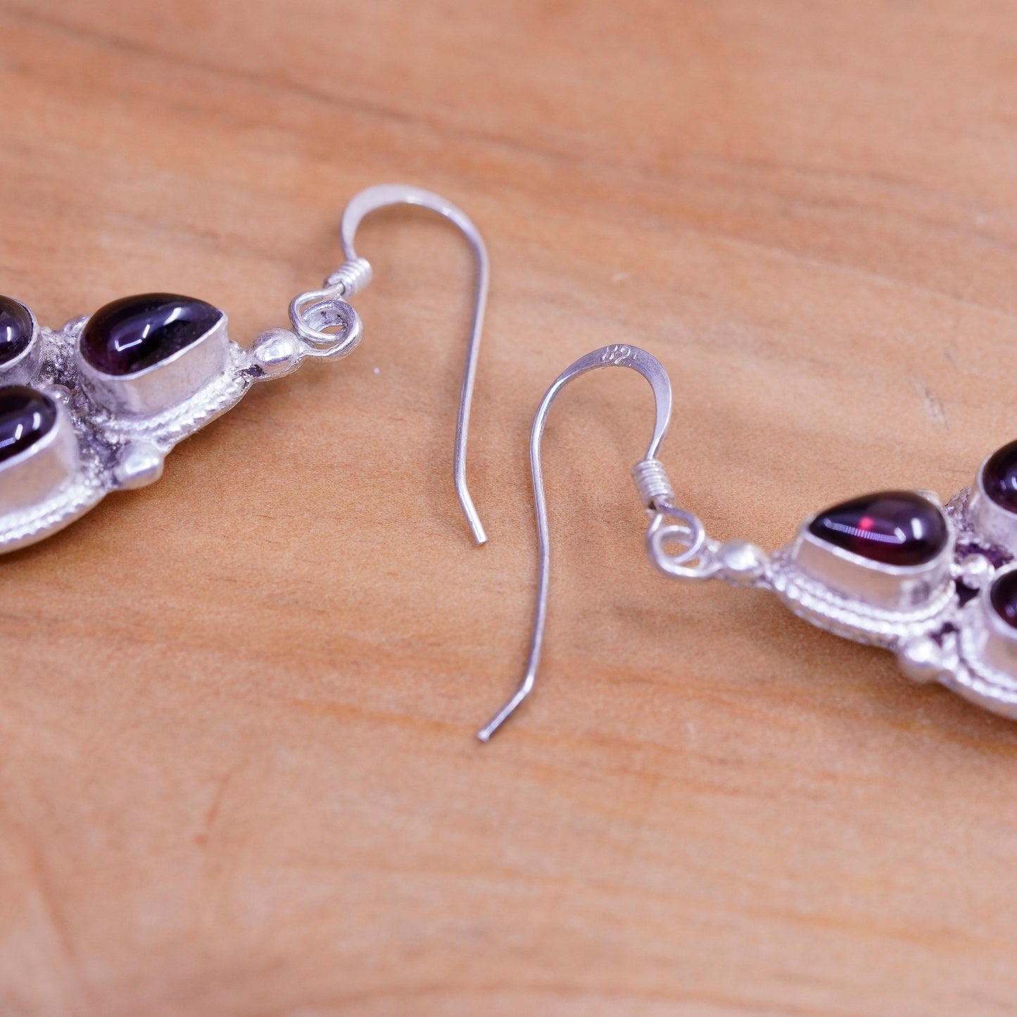 Vintage Nepal Sterling silver handmade earrings with teardrop garnet and cable