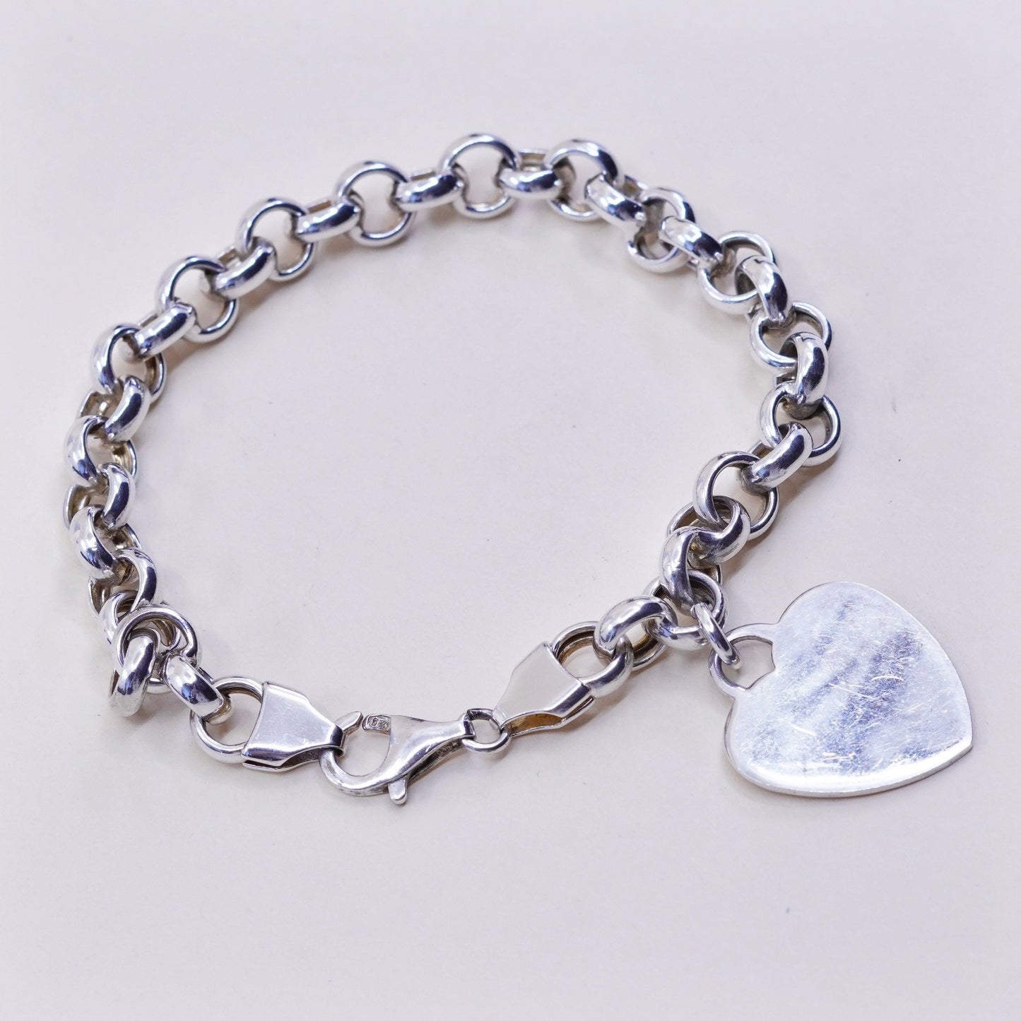 7.25" vtg Italy sterling silver circle bracelet, bold circle chain heart charm