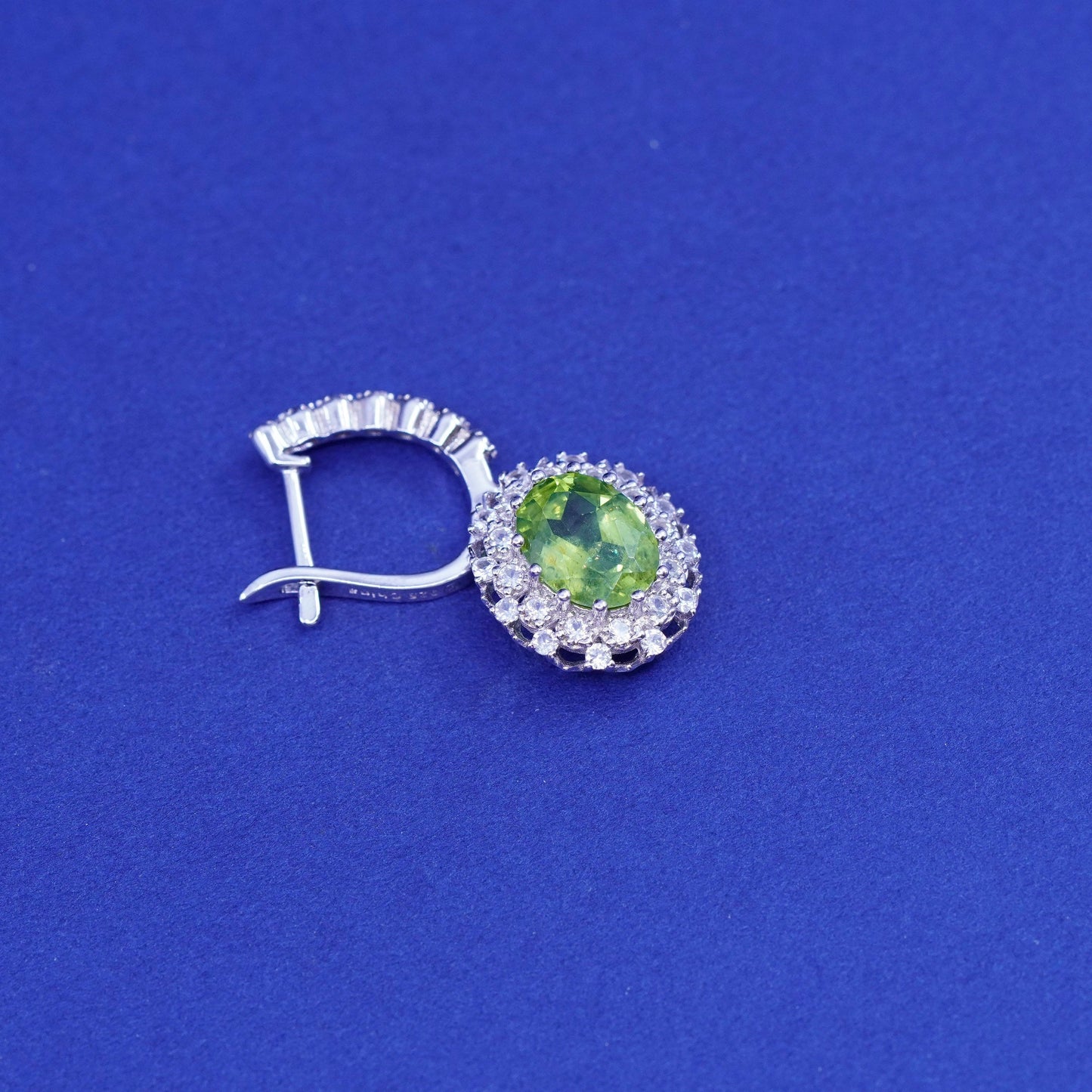 Vintage sterling 925 silver handmade huggie earrings with peridot and cz around