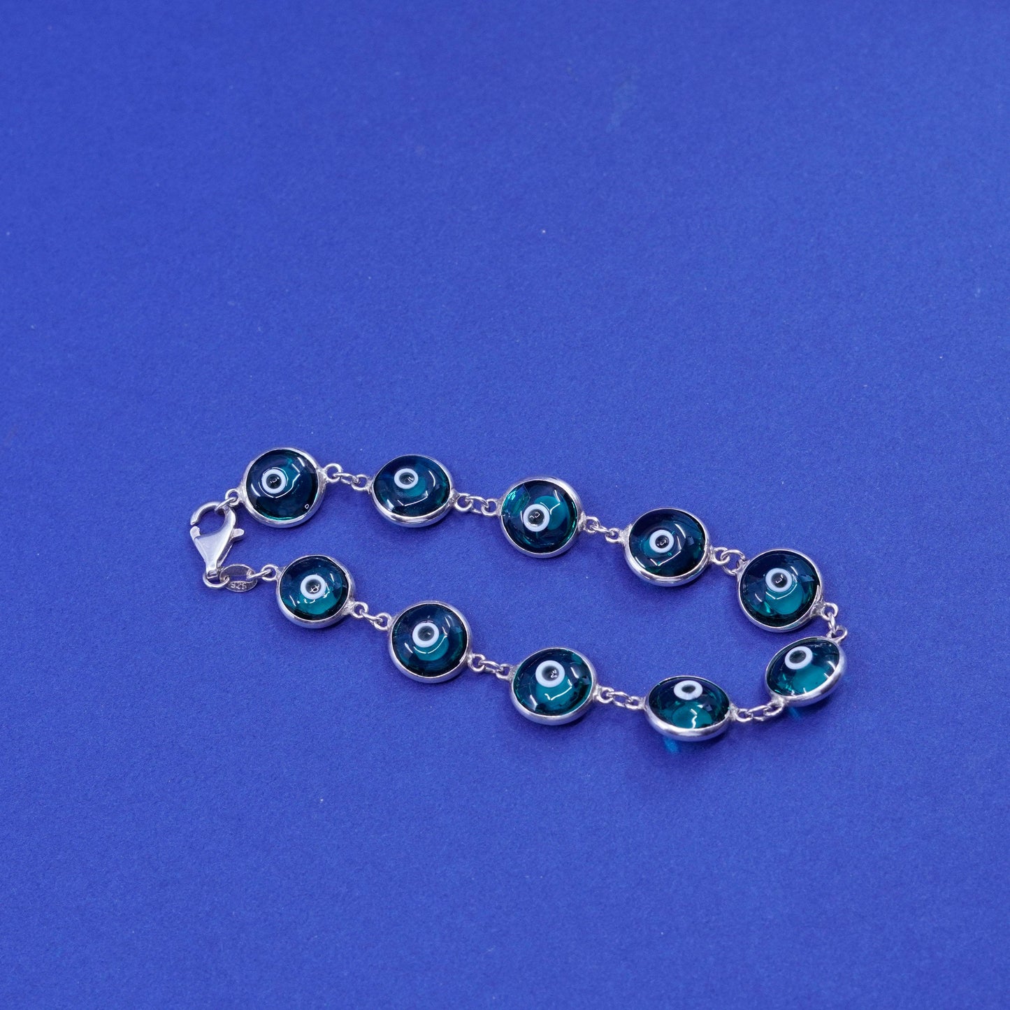 6.75”, Vintage handmade sterling 925 silver bracelet, blue glass evil eye beads