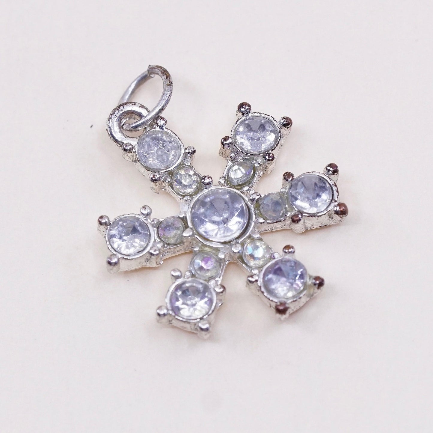 Vintage silver tone snowflake pendant charm with Cz