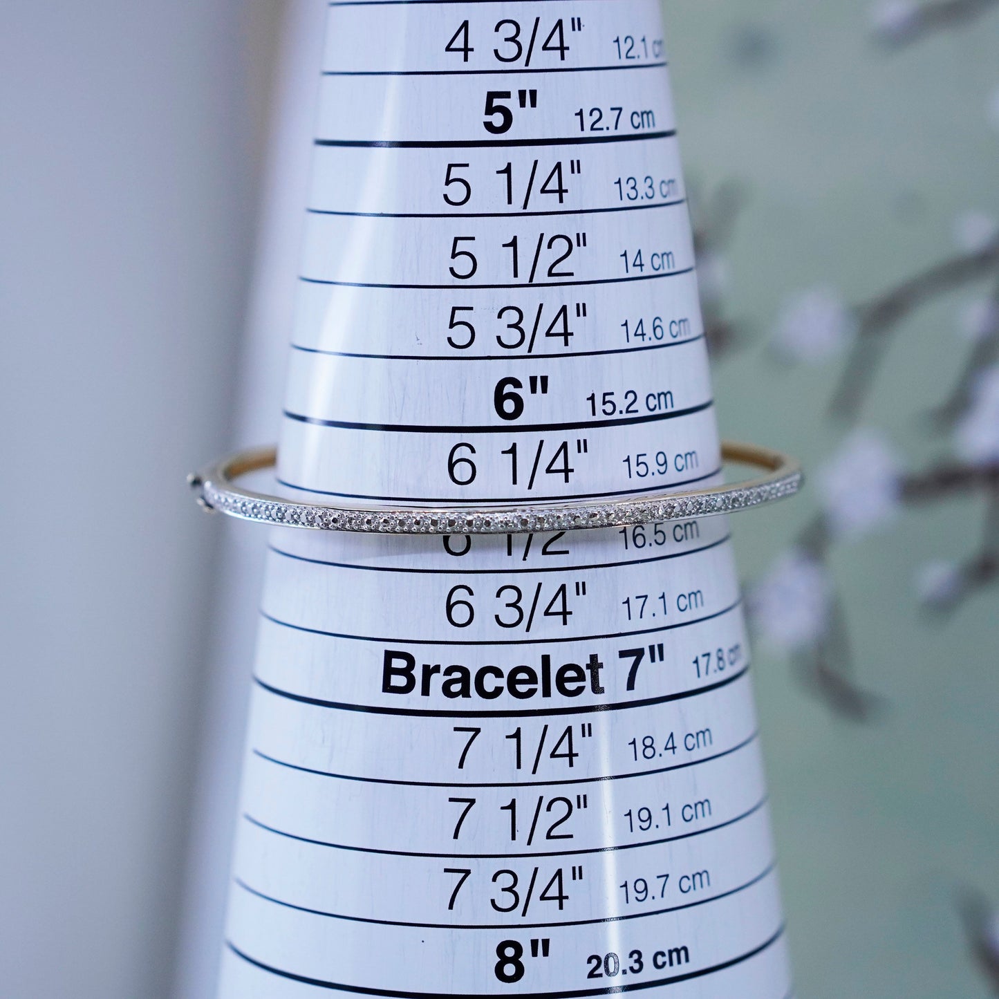 6.5”, vermeil gold over Sterling silver hinged bangle bracelet with diamond